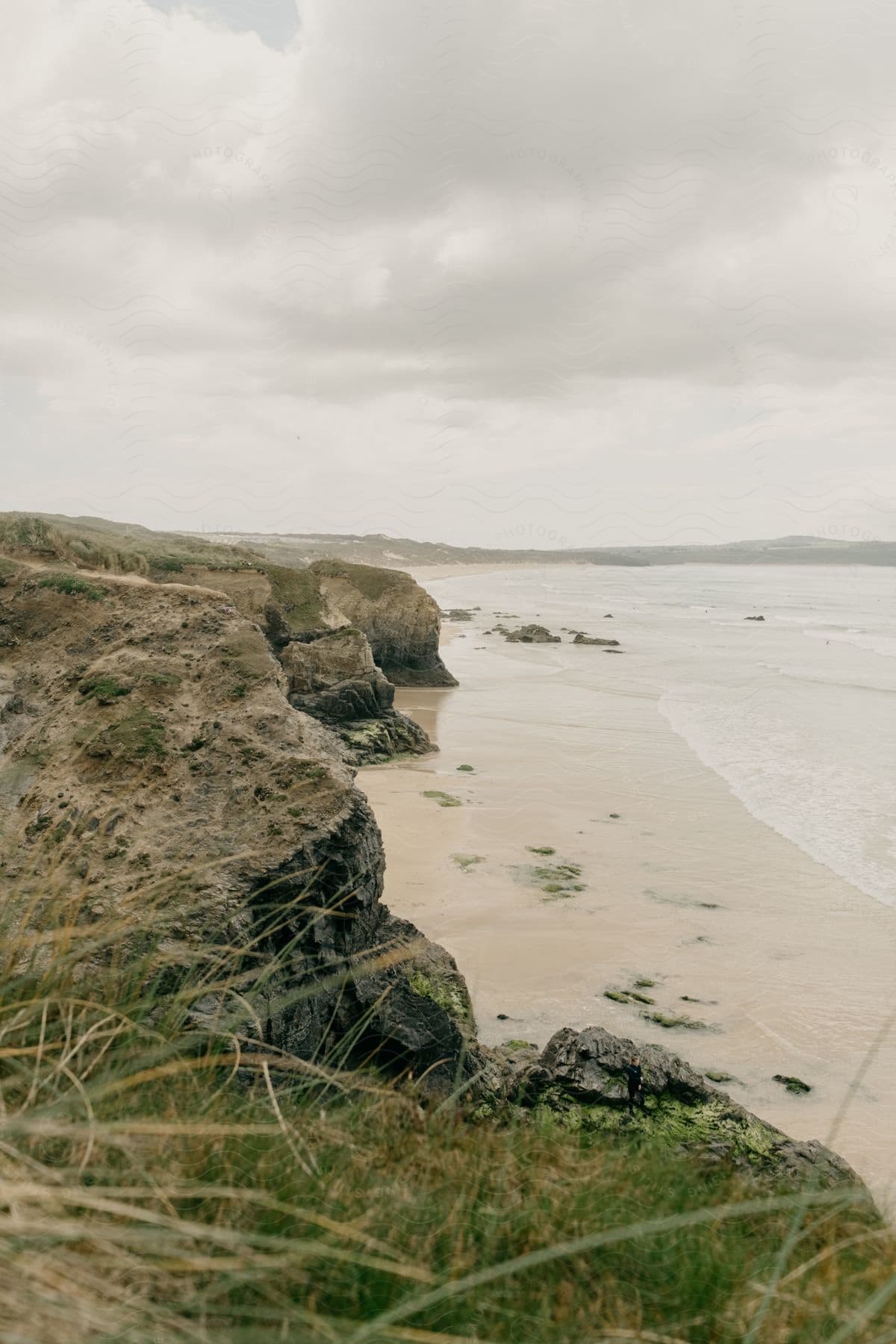 A serene coastal landscape with water sky and vegetation