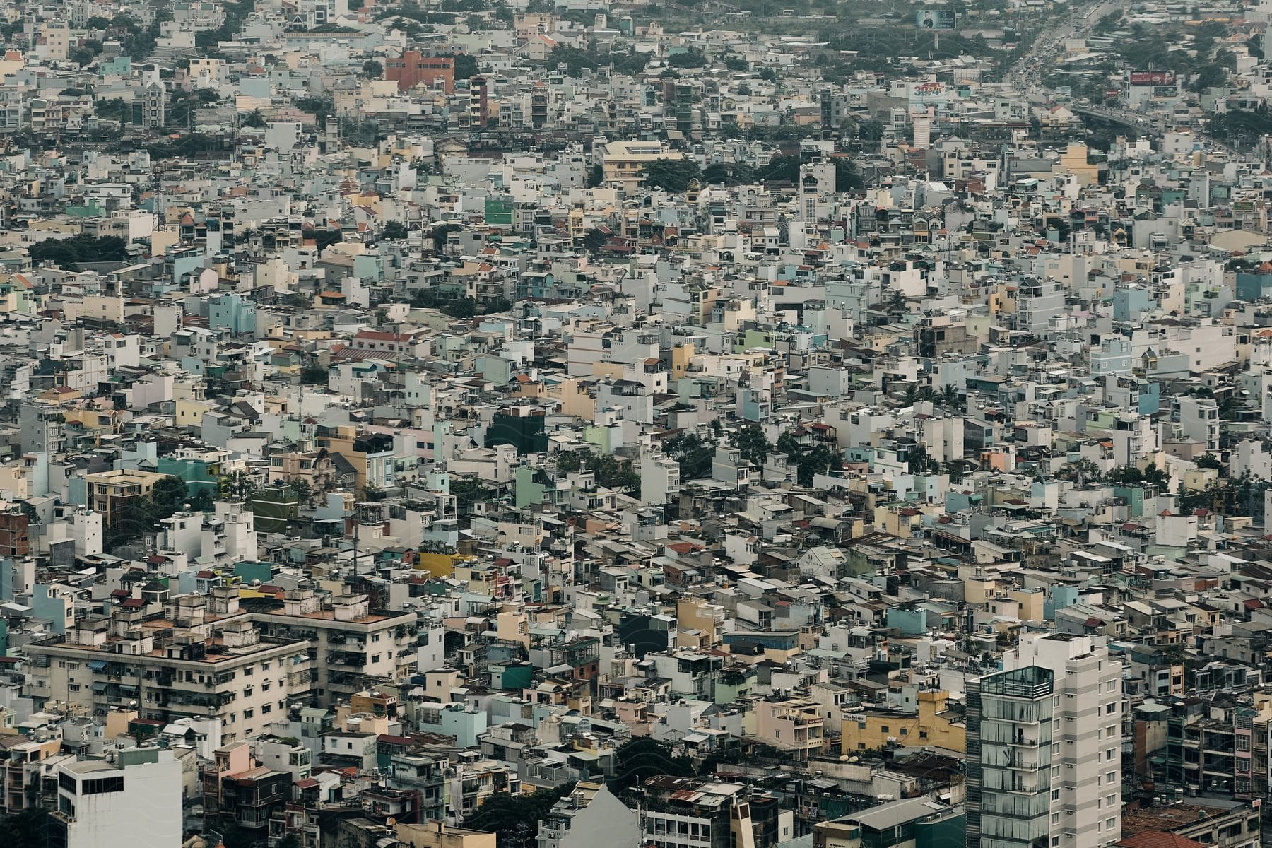 Aerial view of a cityscape with buildings and infrastructure