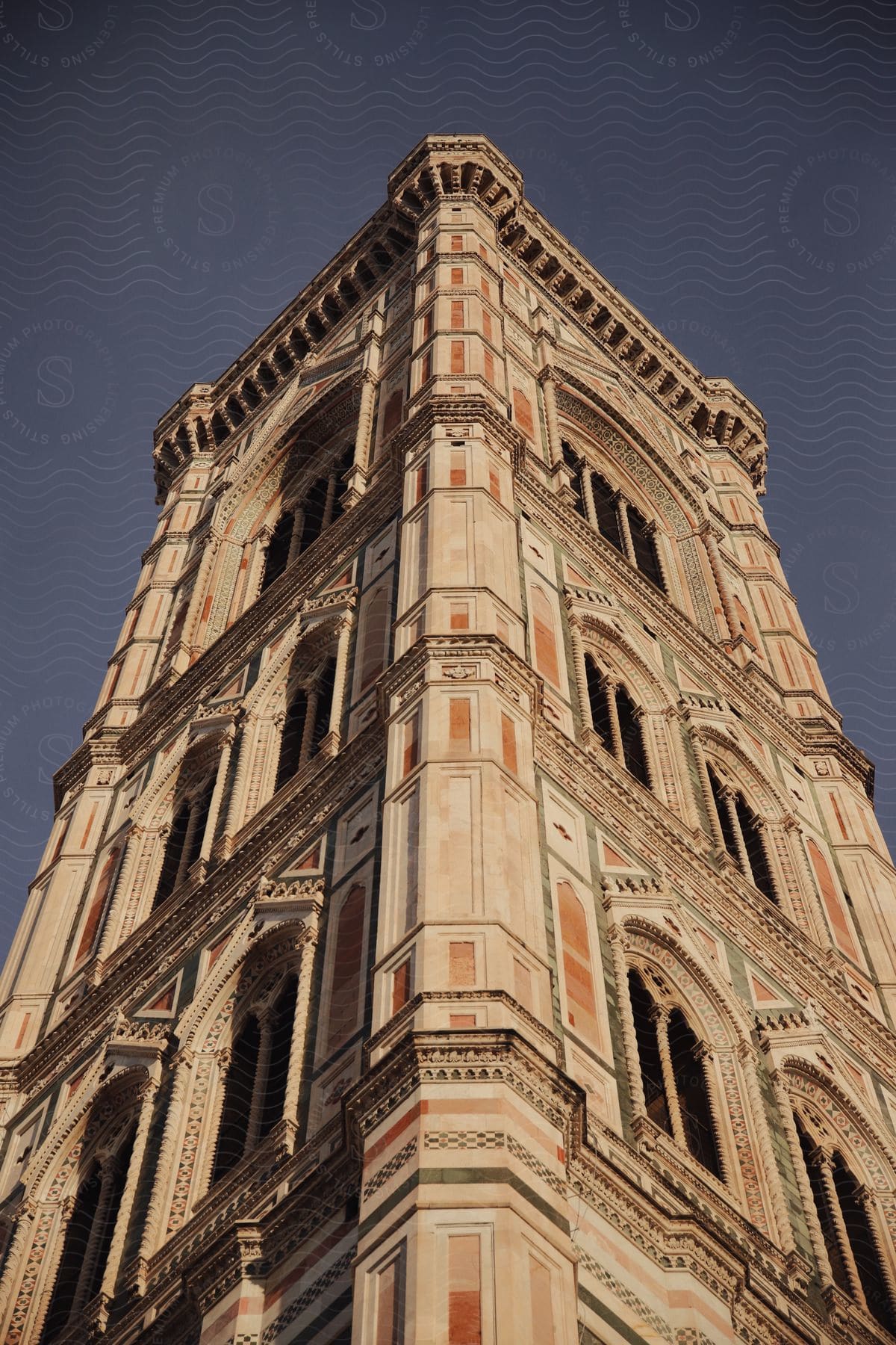 A tall building in a city part of the cathedral of santa maria del fiore in florence