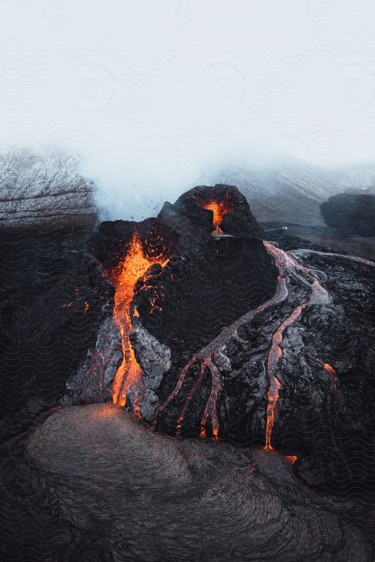 A stunning aerial view of an erupting volcano.