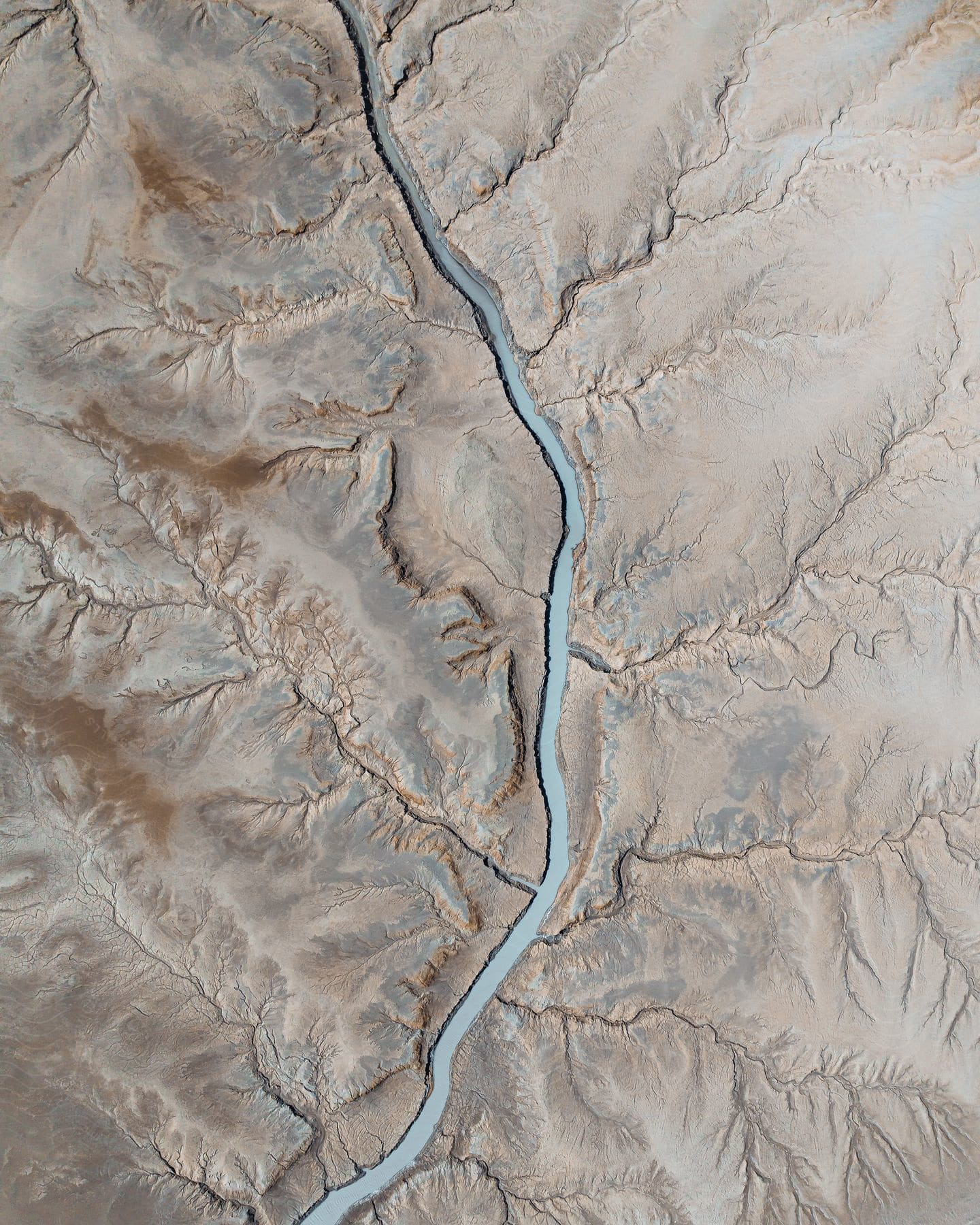 Top-down view of a river on the desert