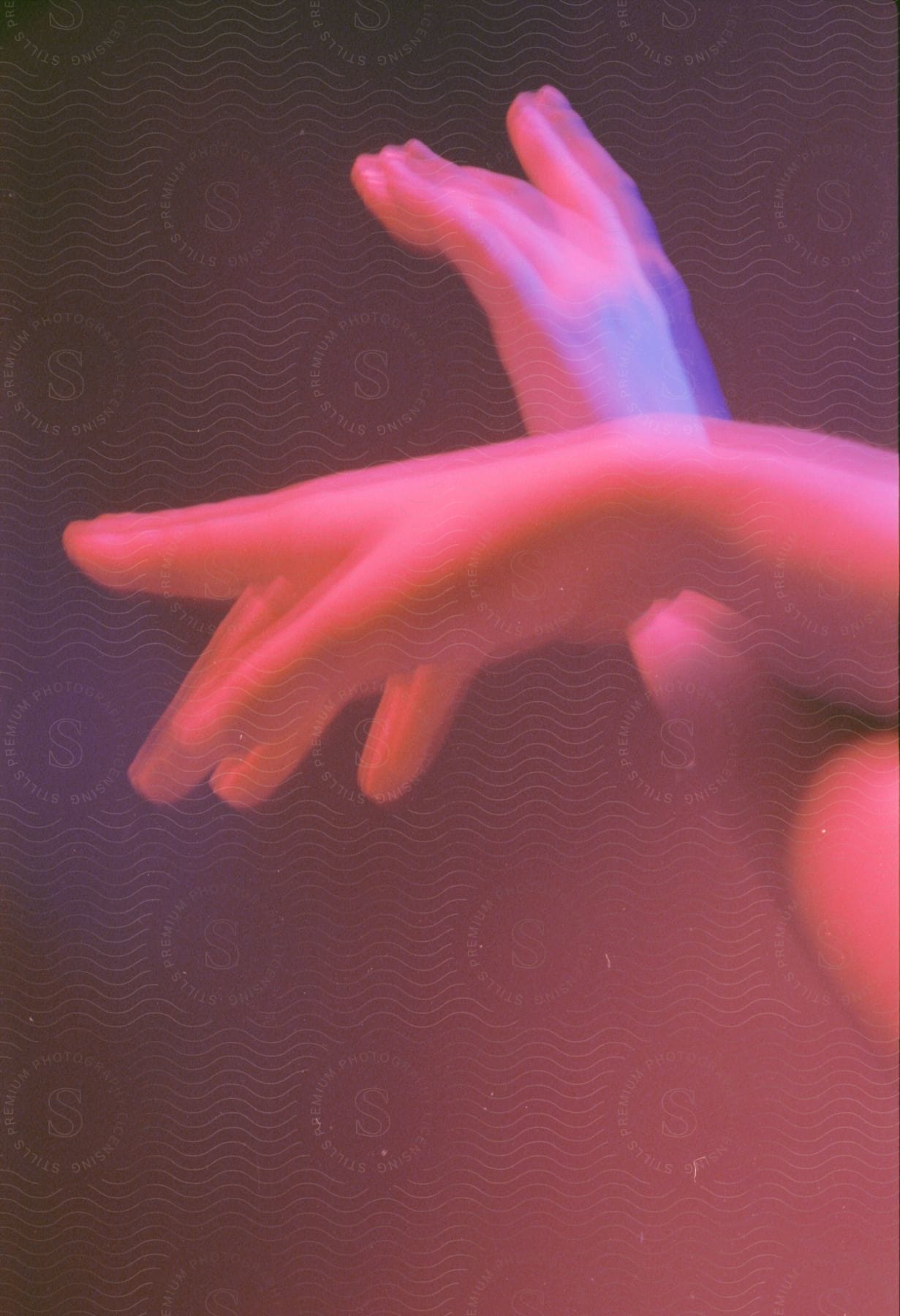 A Persons Hand With A Neutral Gesture