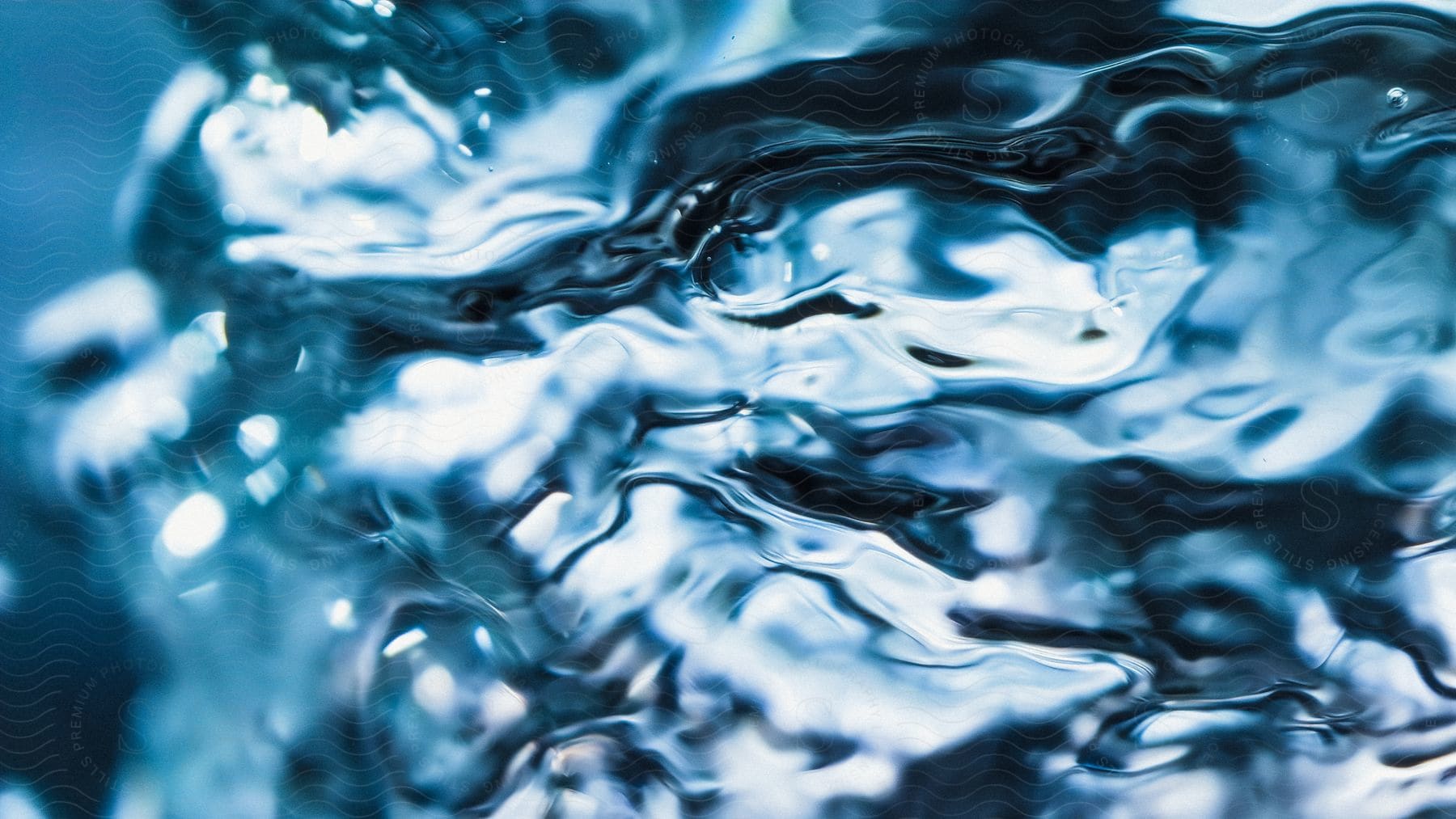 An abstract art depicting ripples in the water.