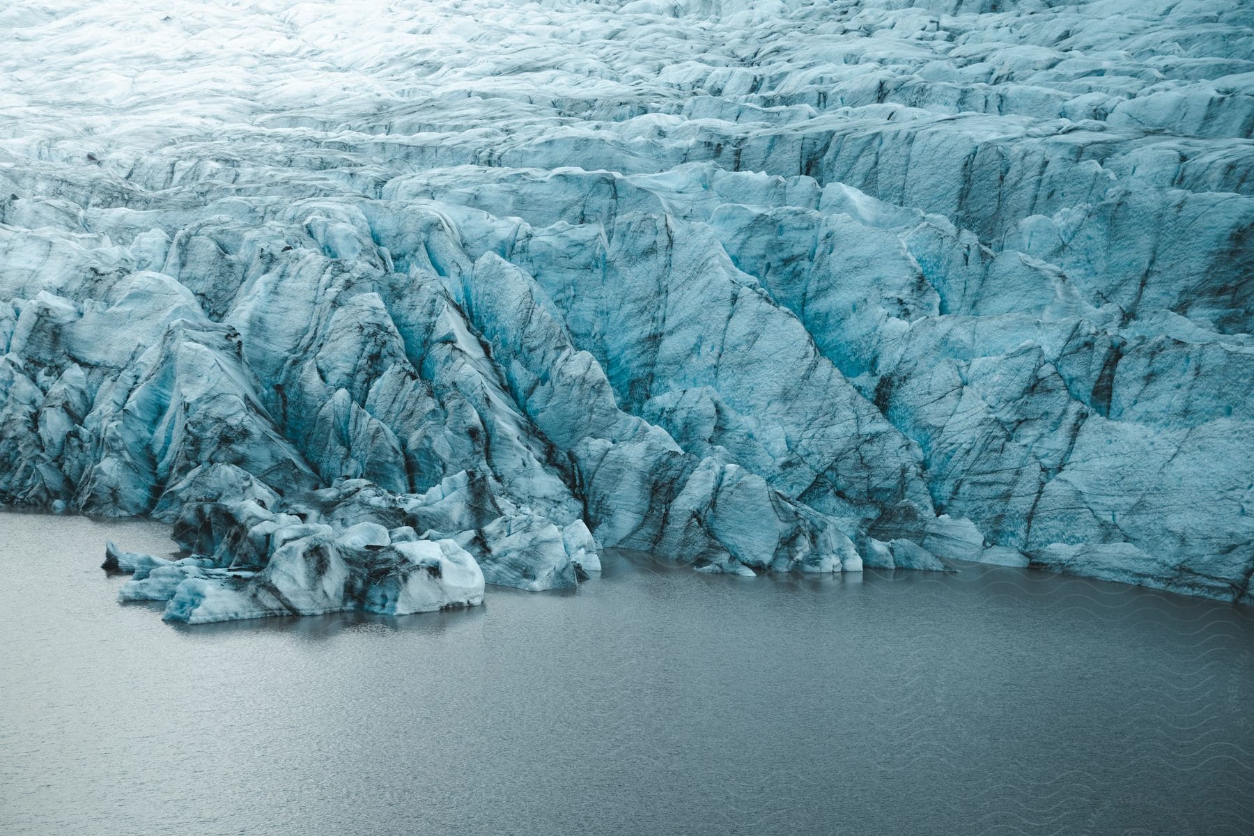 Aerial shot of glaciers near the ocean