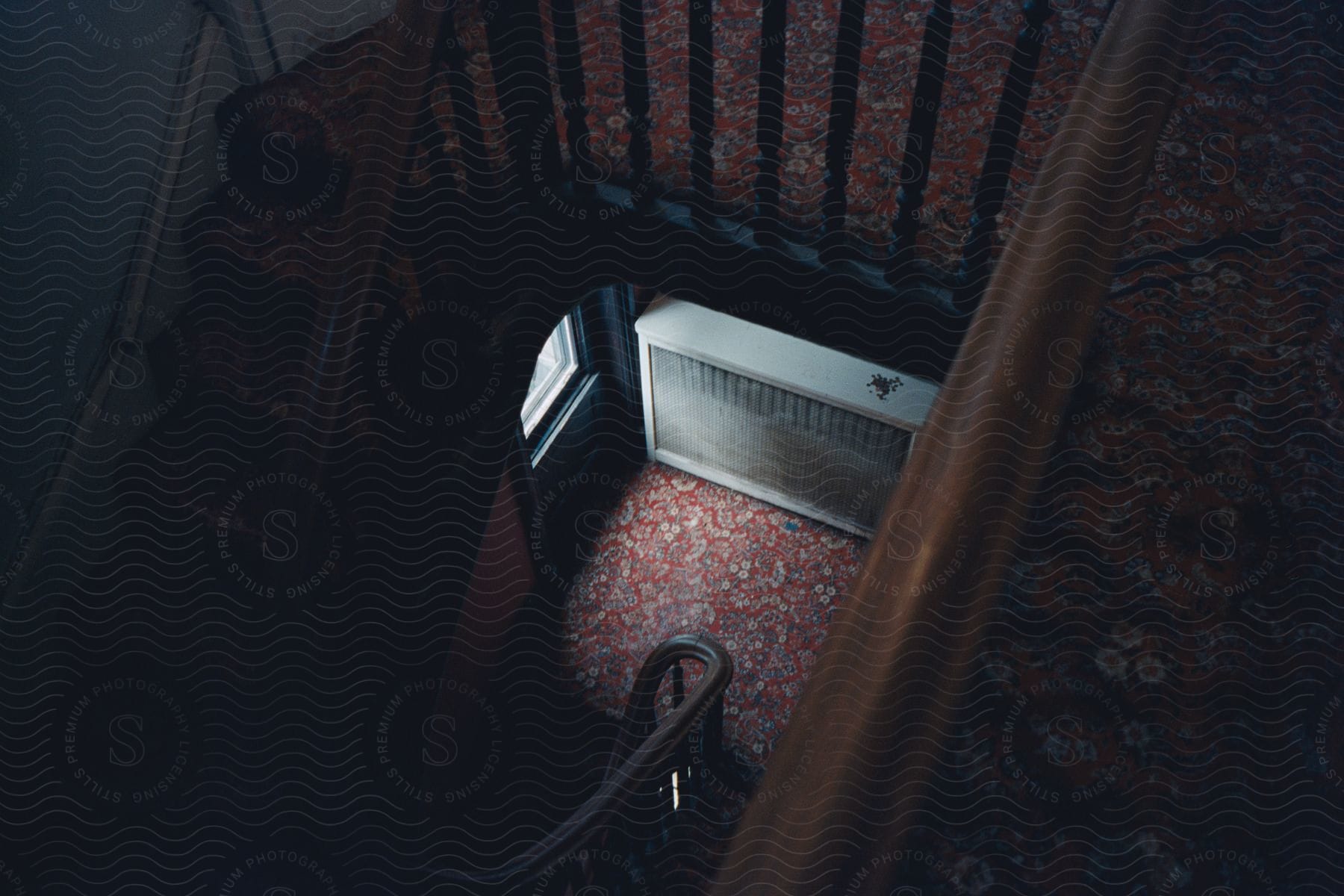 A Radiator On A Staircase In An Old House