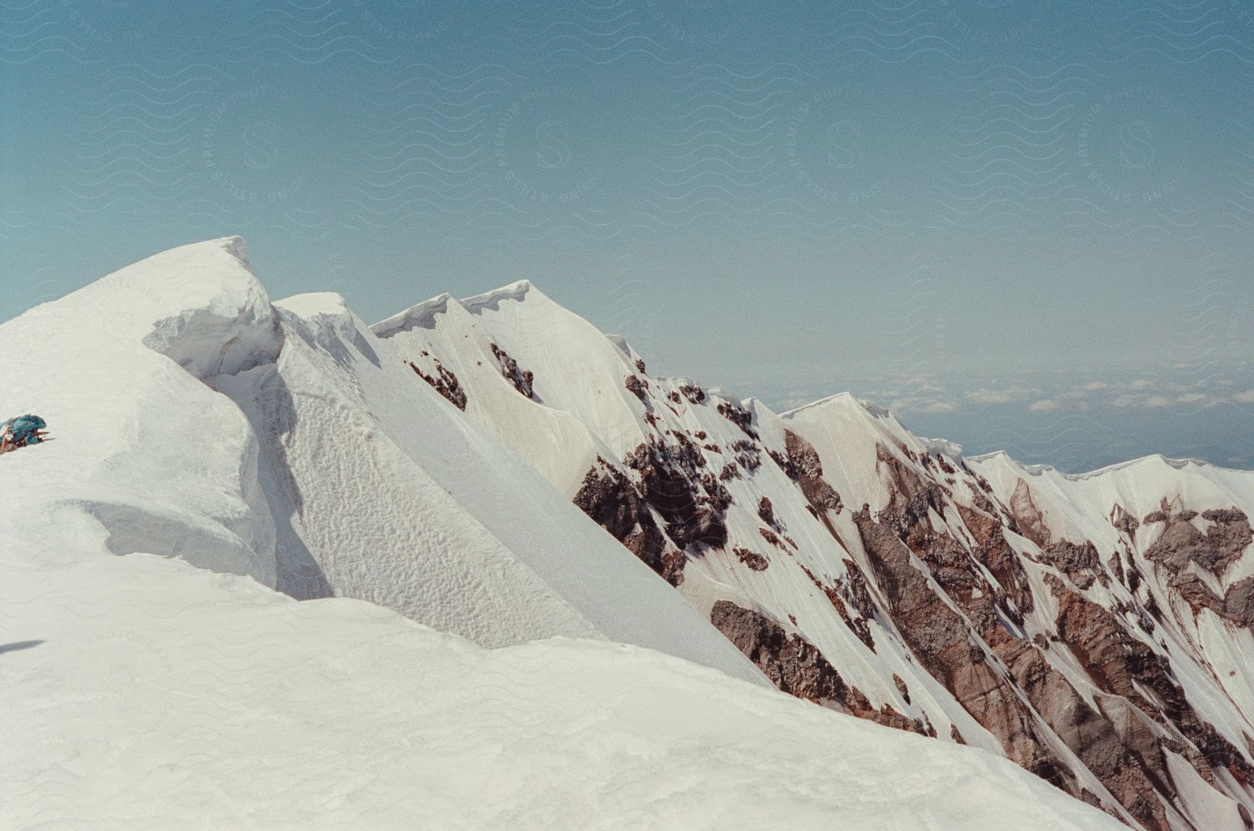 A serene mountain landscape covered in snow and ice