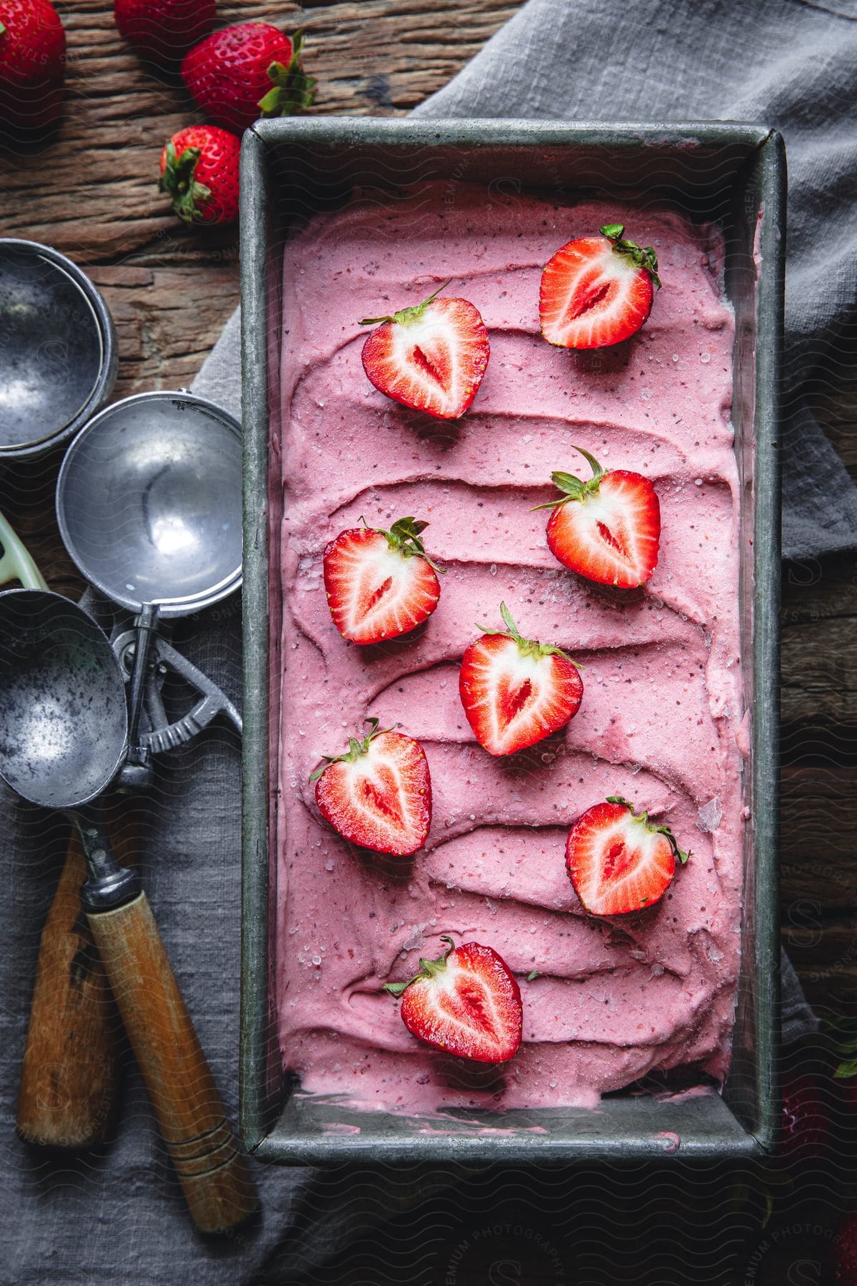 A dish of strawberry ice cream