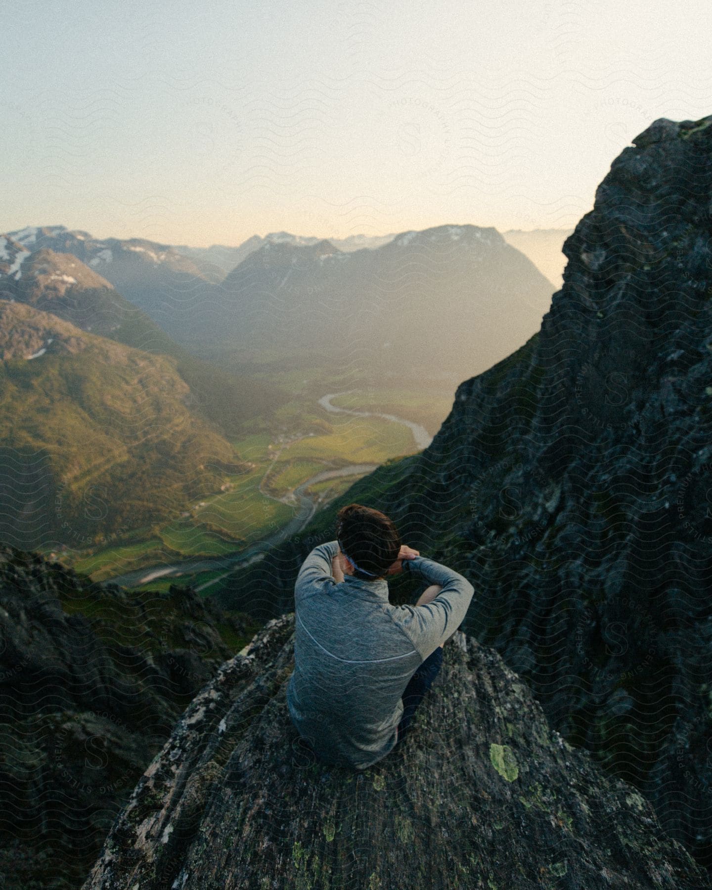 A happy man sitting in nature