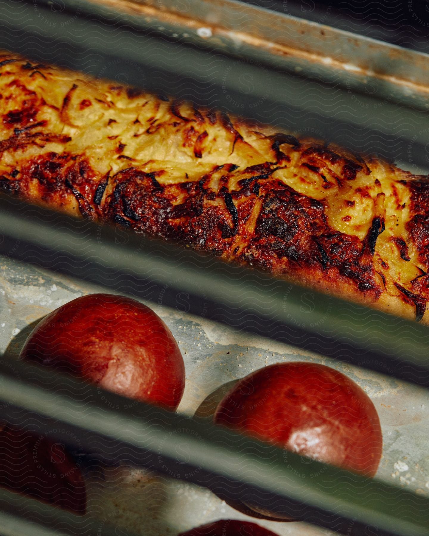 A baked food in a baking pan and a sandwich beside it