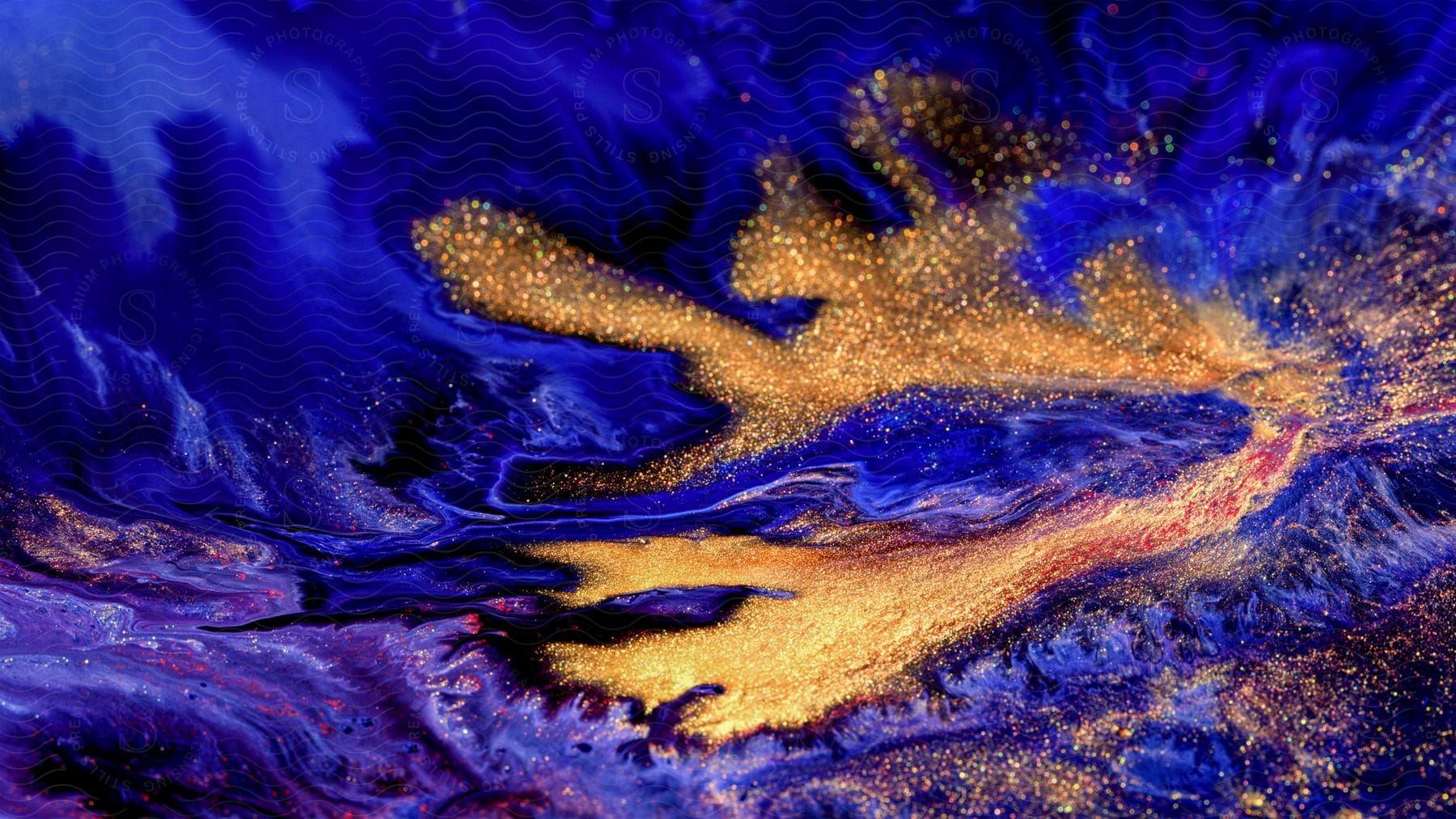 Swirling colors in stone create a surreal and abstract landscape