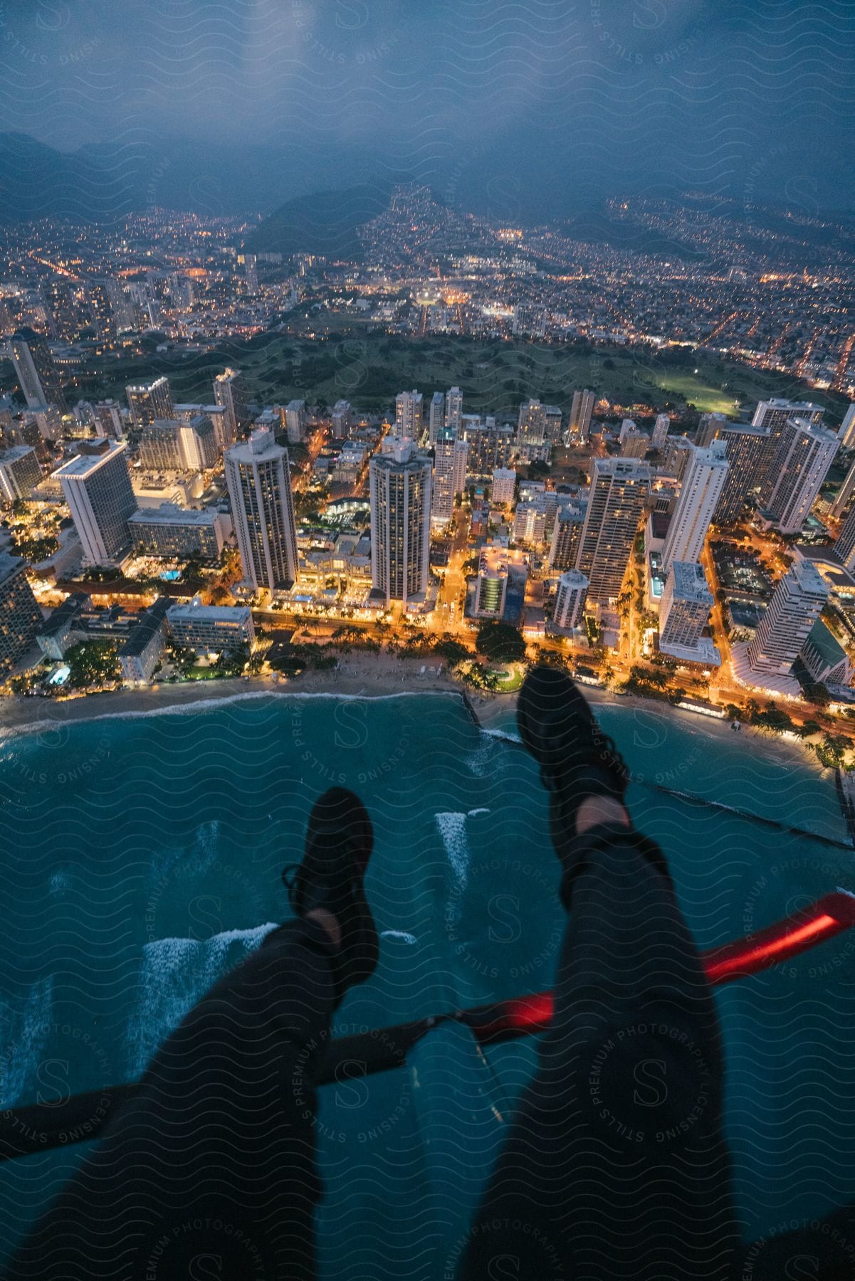 A person explores a city with water buildings and a skyline