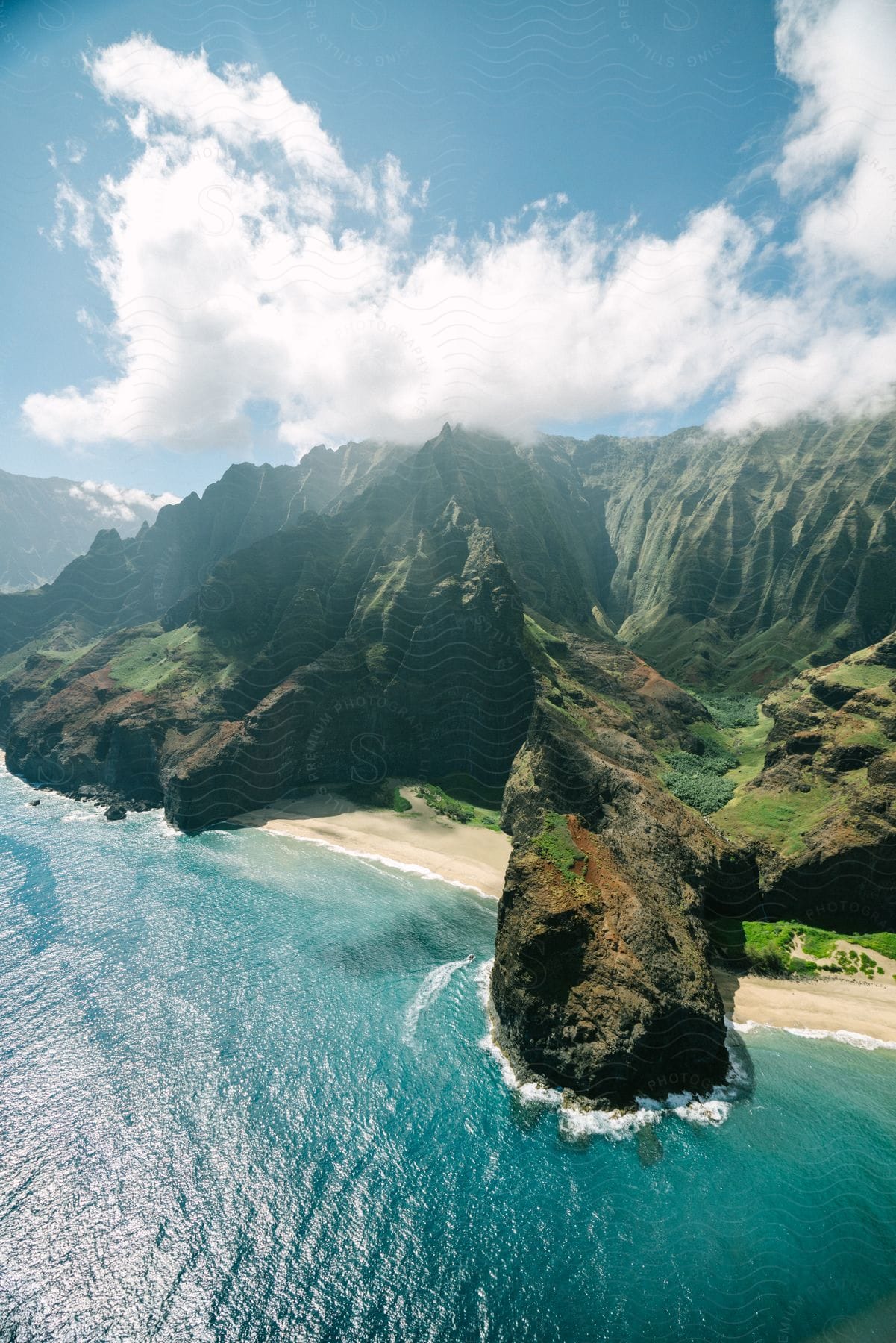 Clear blue water beaches surrounded by rocky terrain