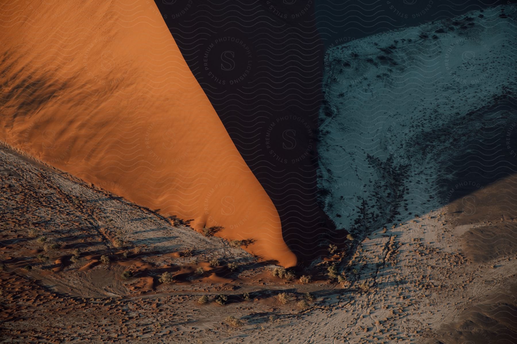 A mountain at sunset in a desert landscape