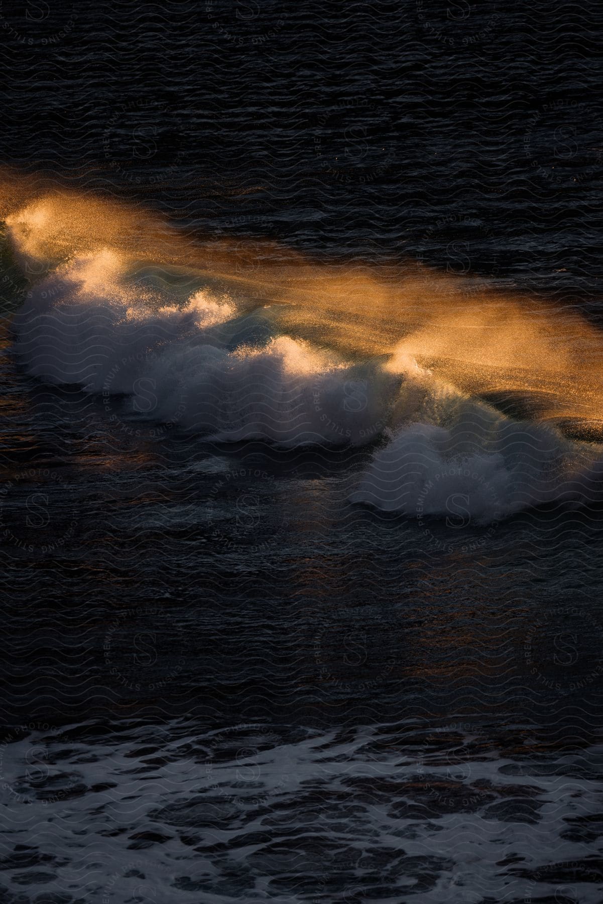 Ocean waves at sunset