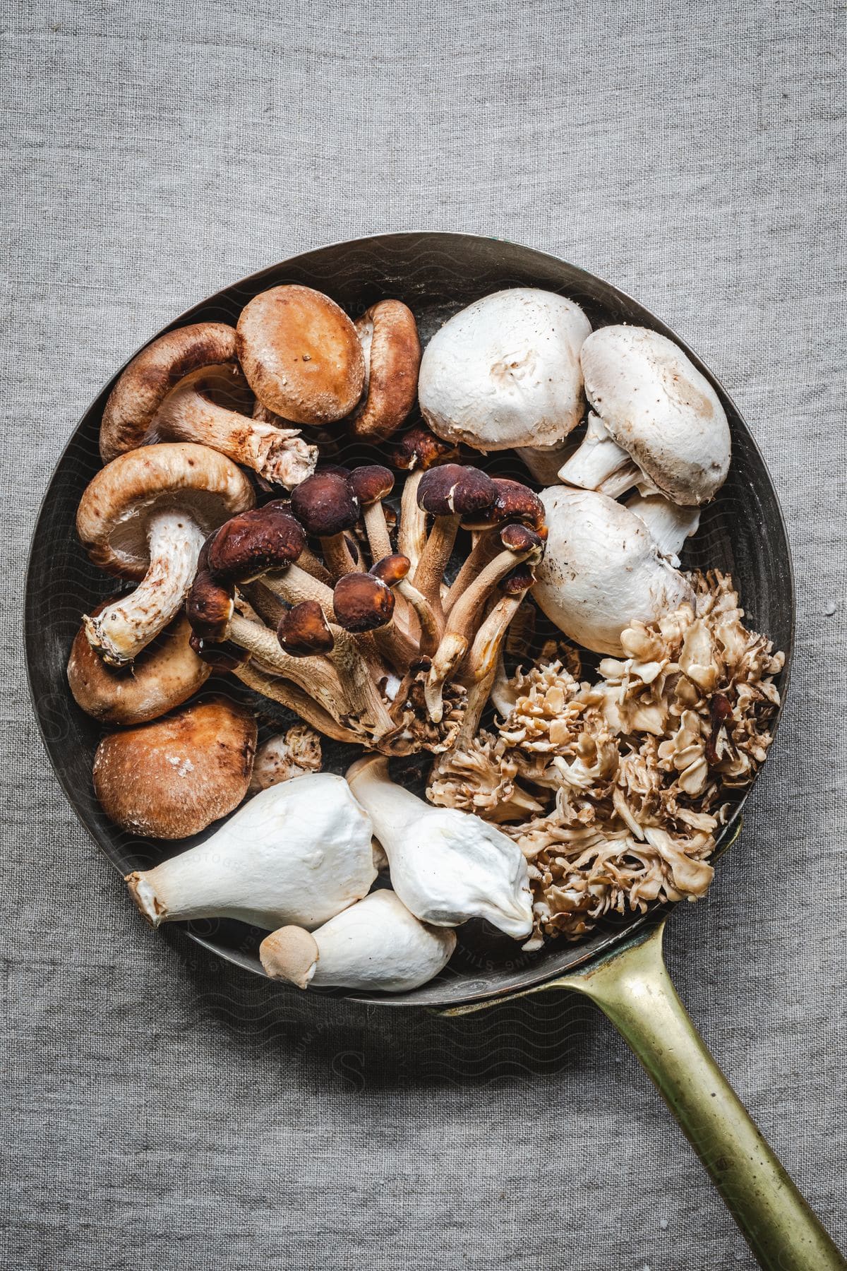 A wooden plate with various types of food and ingredients