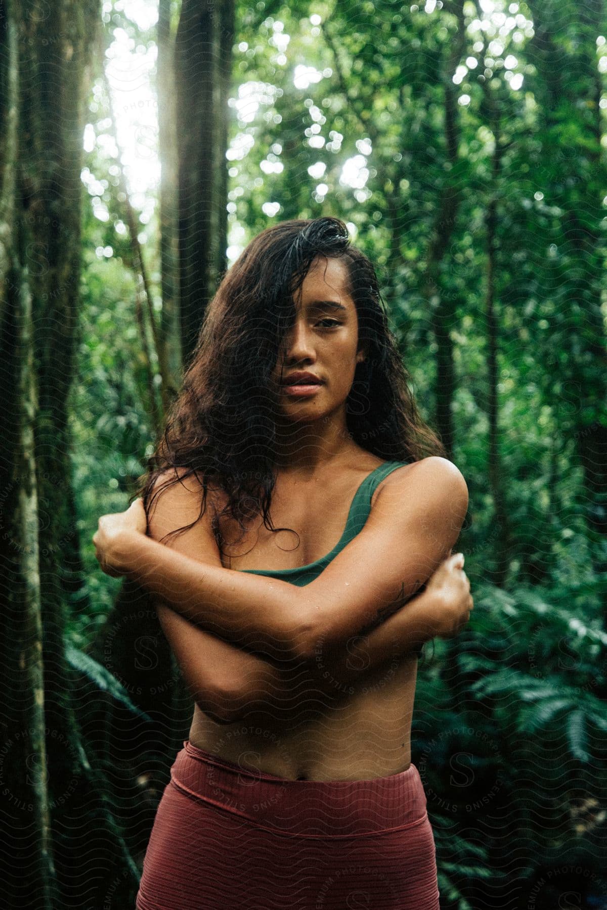 A happy woman in a jungle