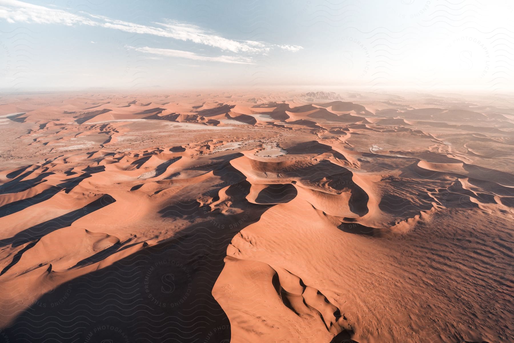 Aerial shot of sand dunes in the desert