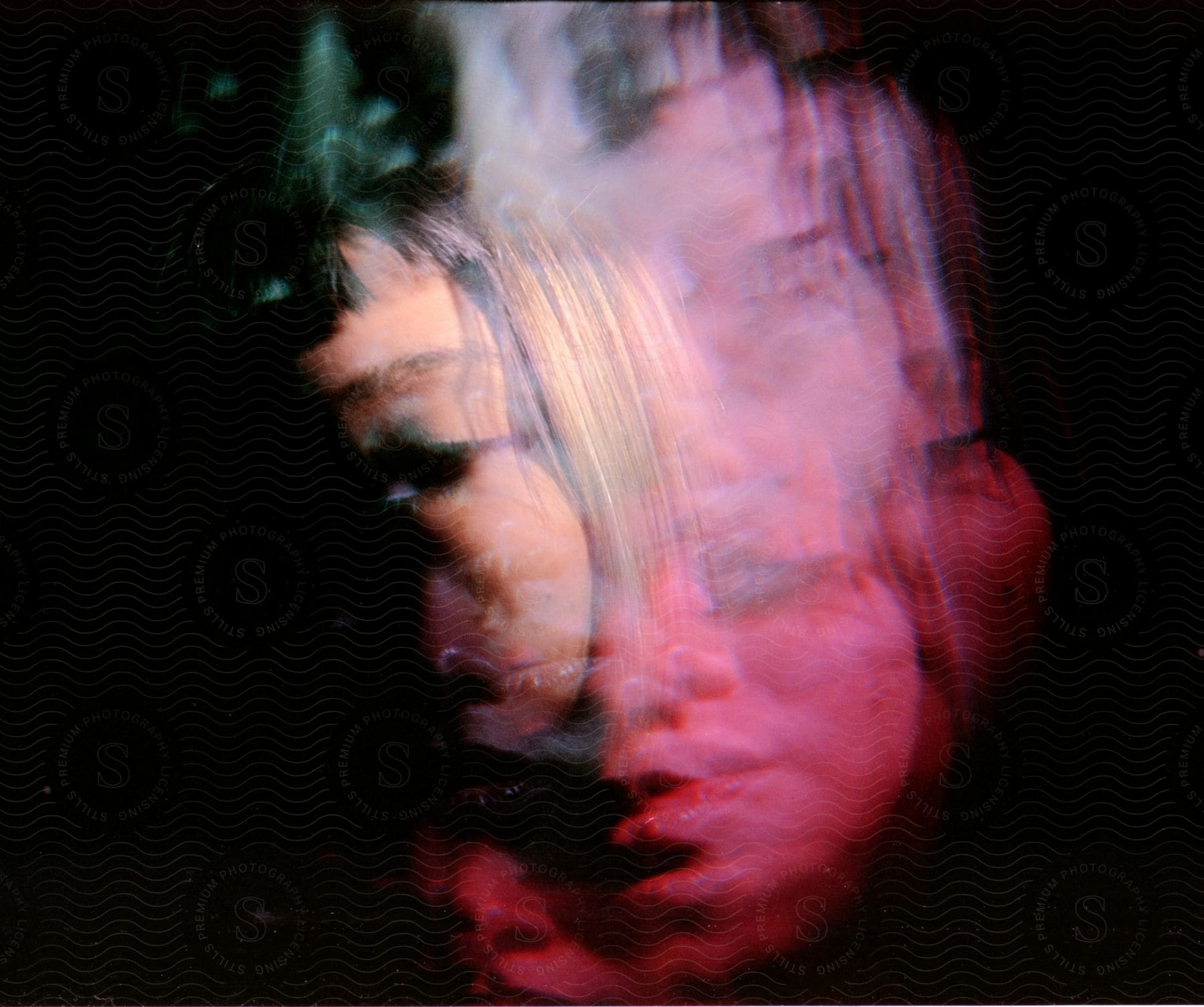 Distorted female face with multiple lighting exposures