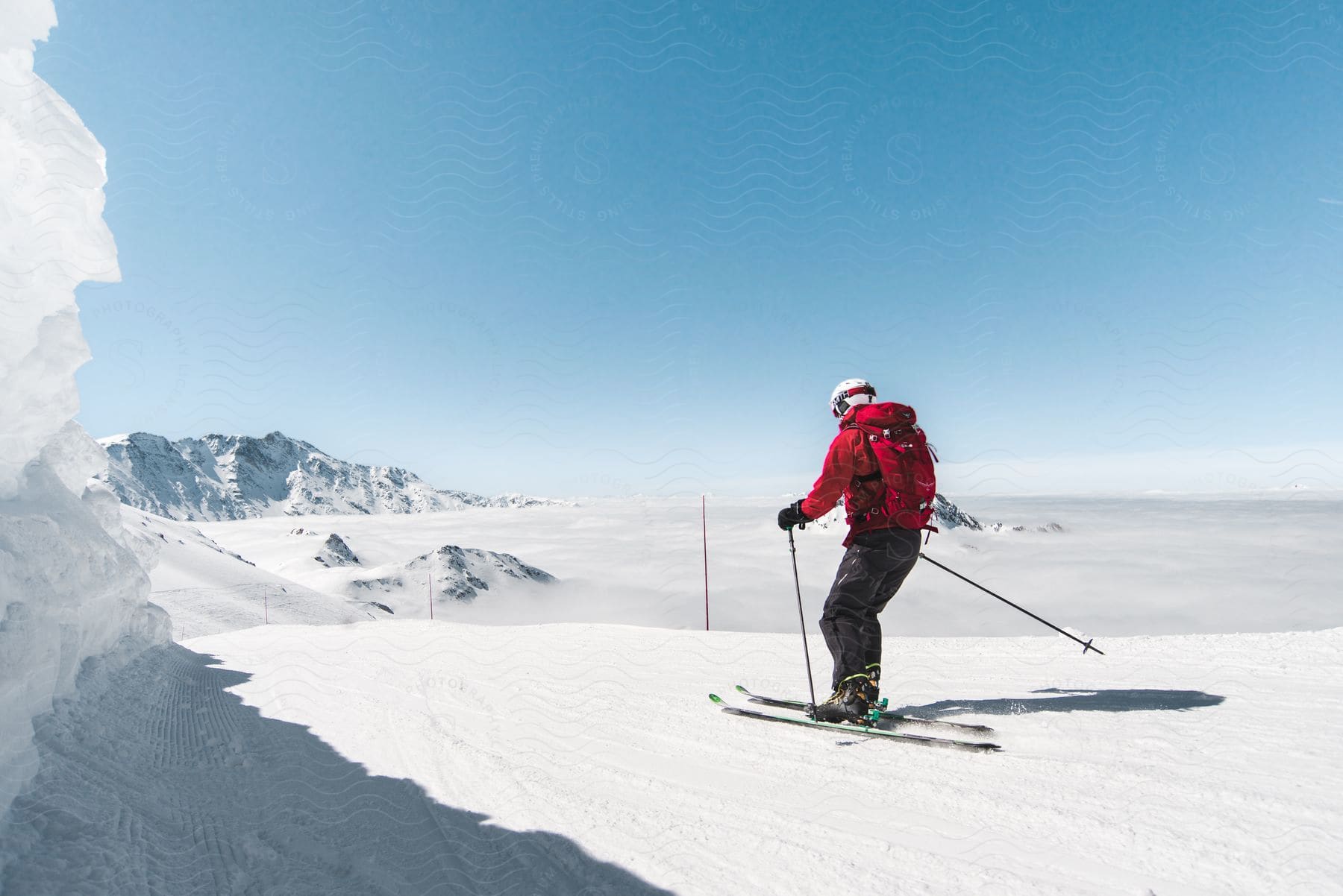 A man skis along a mountain in france
