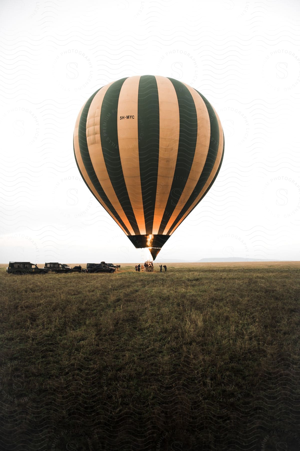 A hot air balloon floating in the sky over tanzania