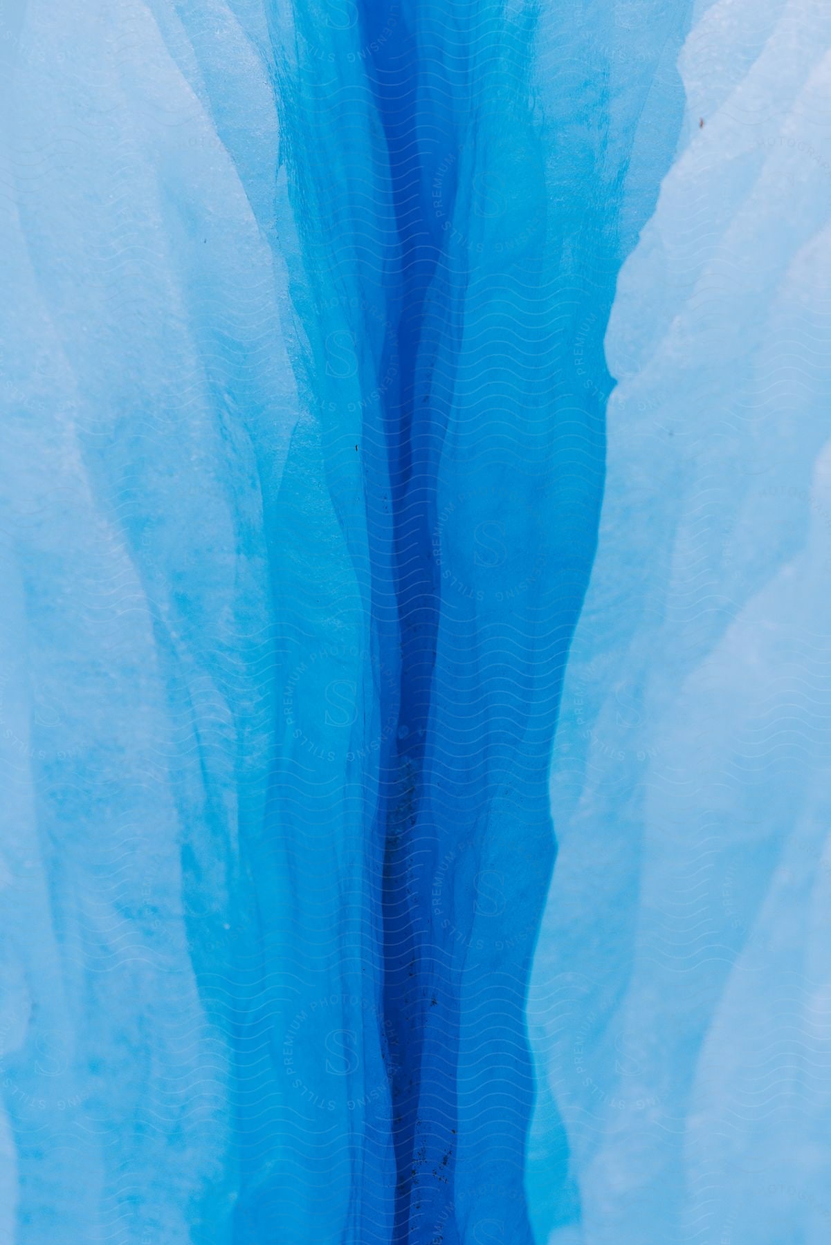 An arctic crevasse splitting the surface apart in patagonia