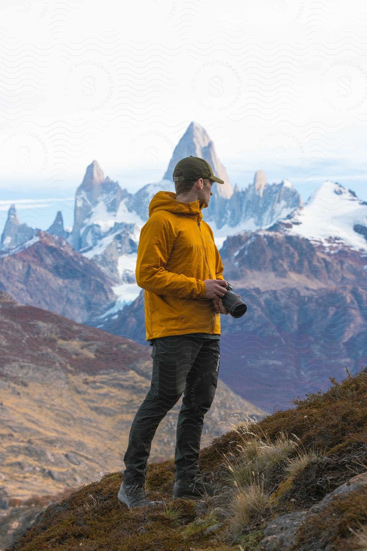 A person standing on a mountain in patagonia