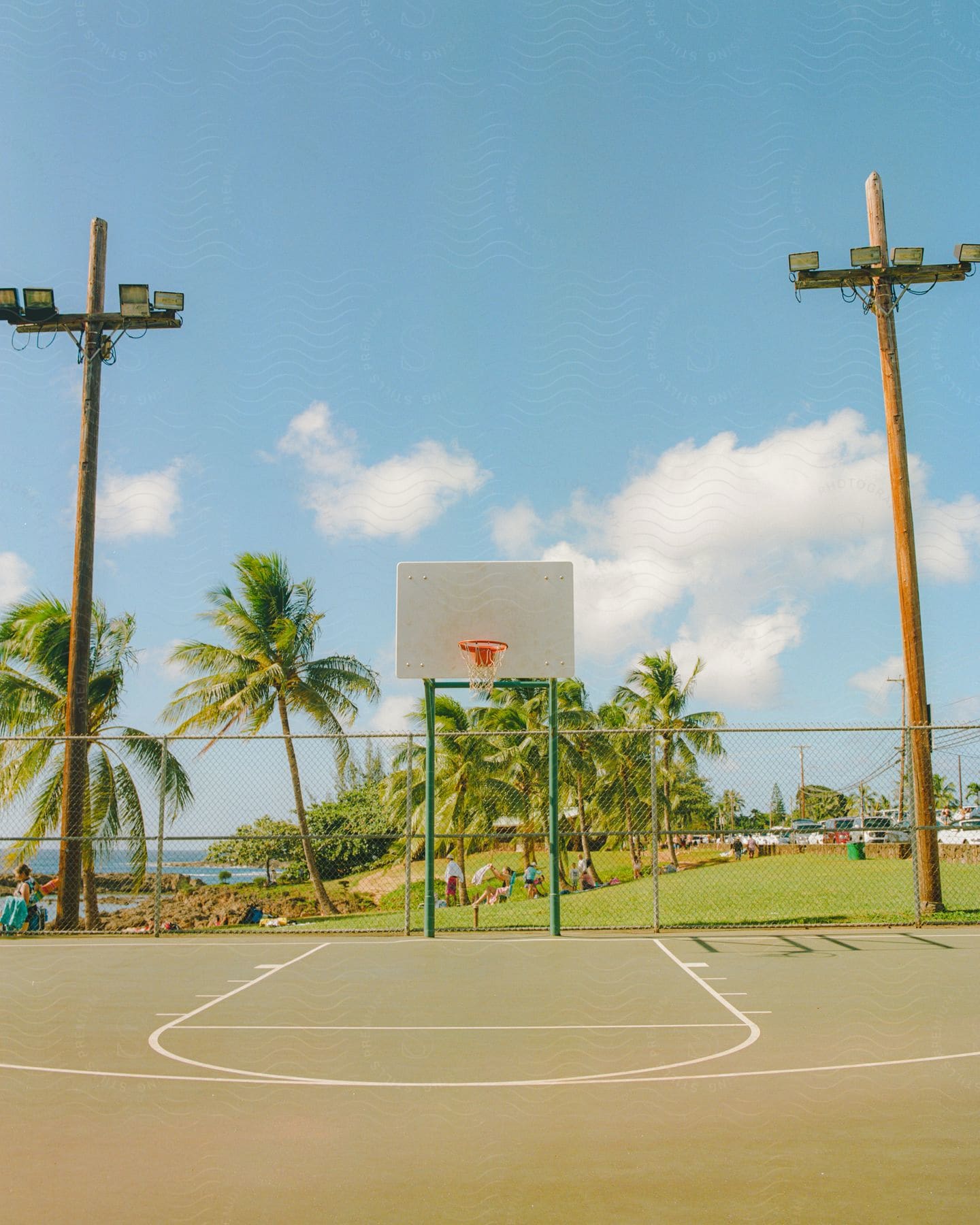 A basketball hoop in a coastal setting