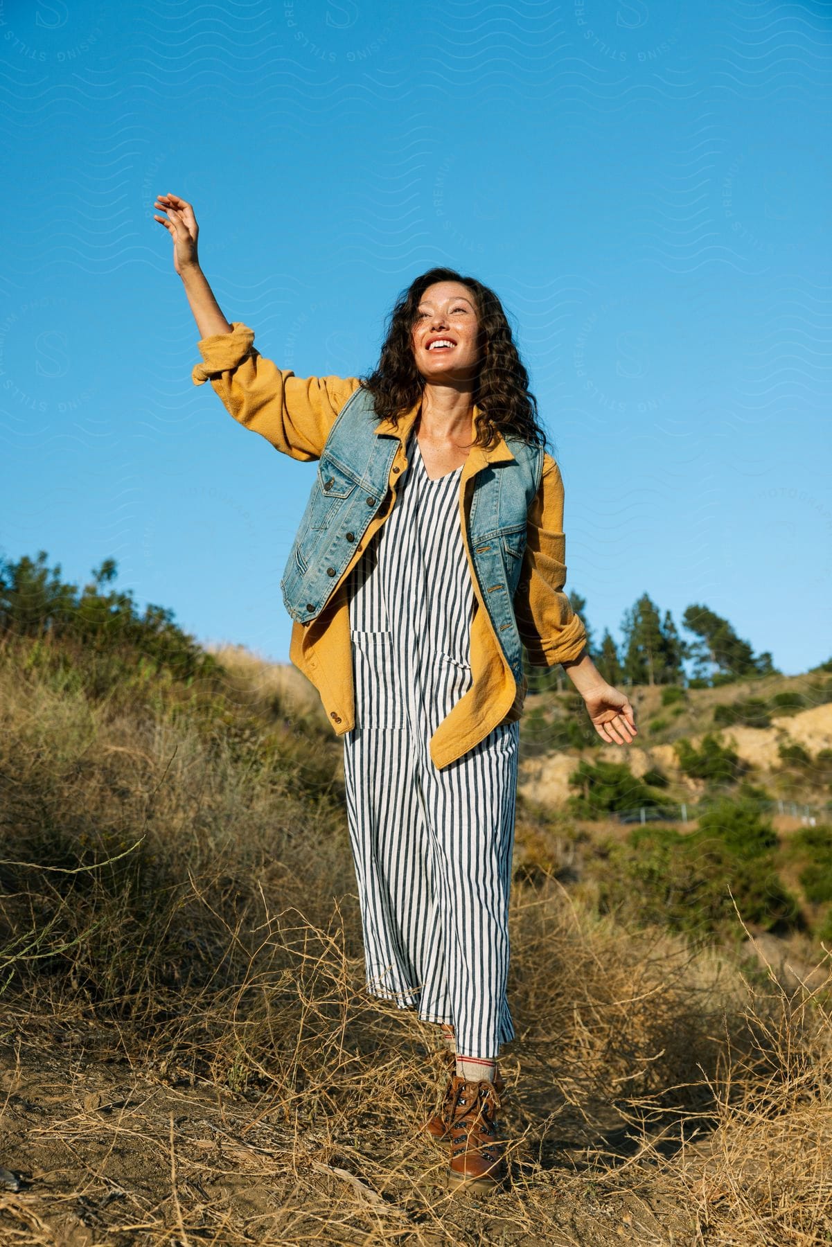 A woman standing outdoors during spring