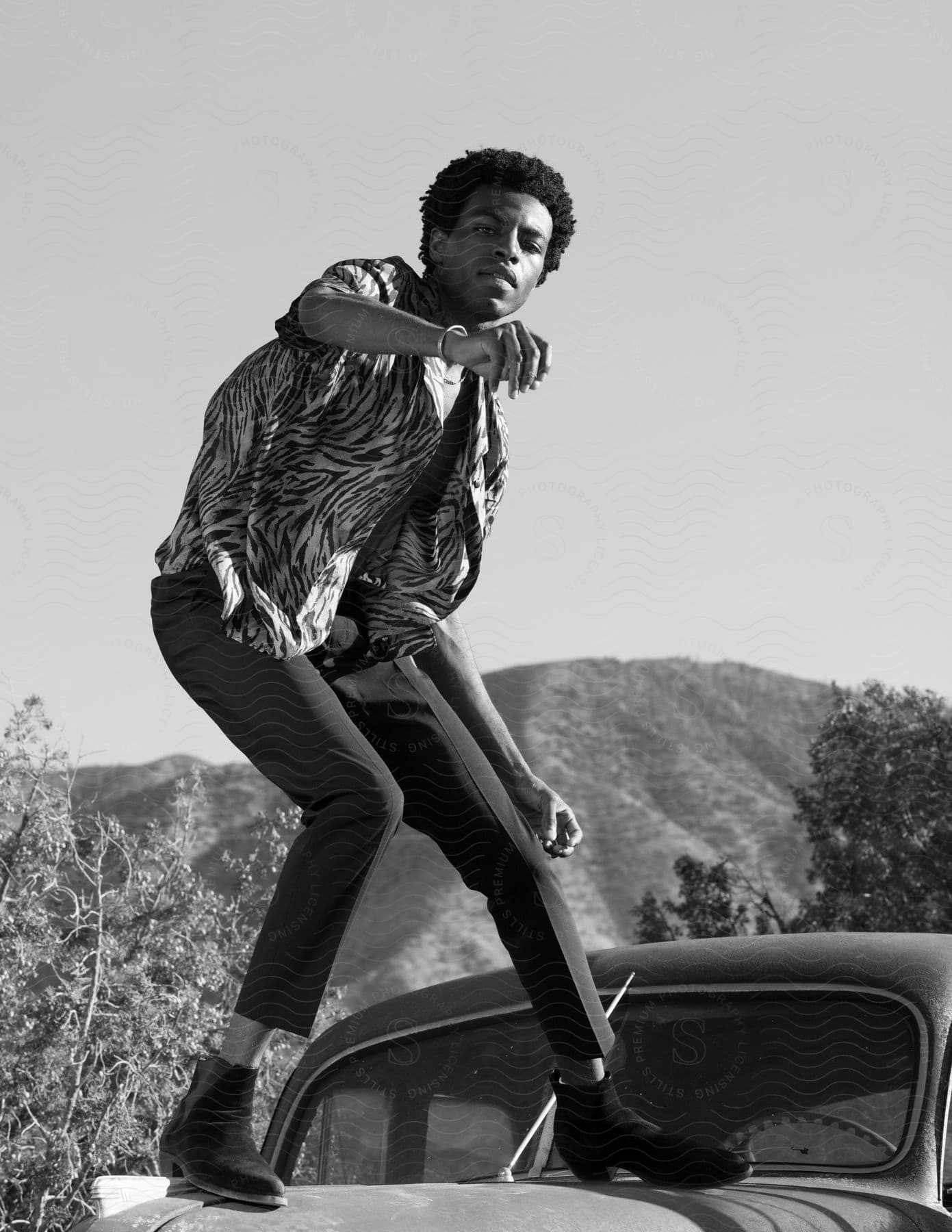 A person in a car having fun in the desert