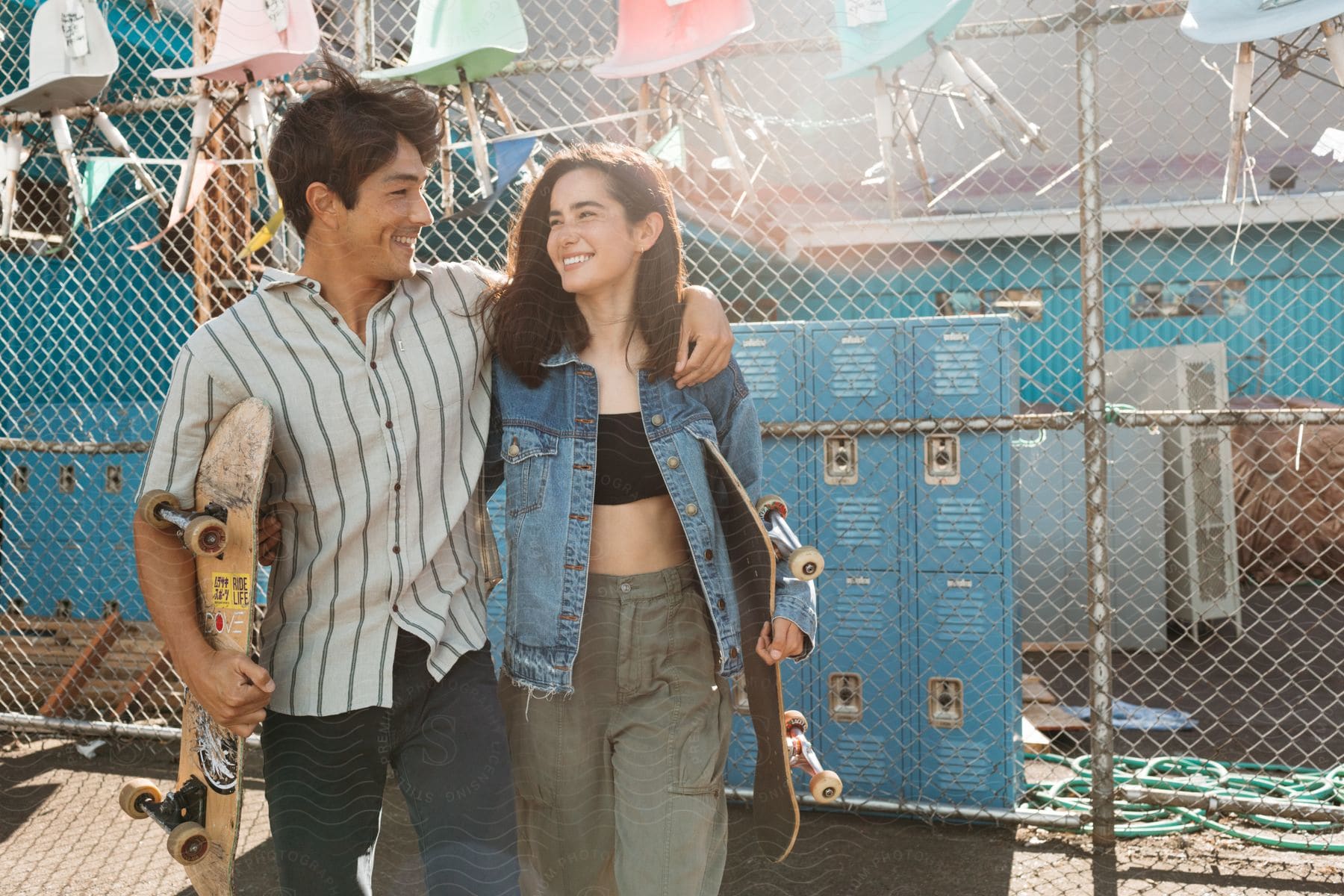 Two people having fun and being carefree while skateboarding