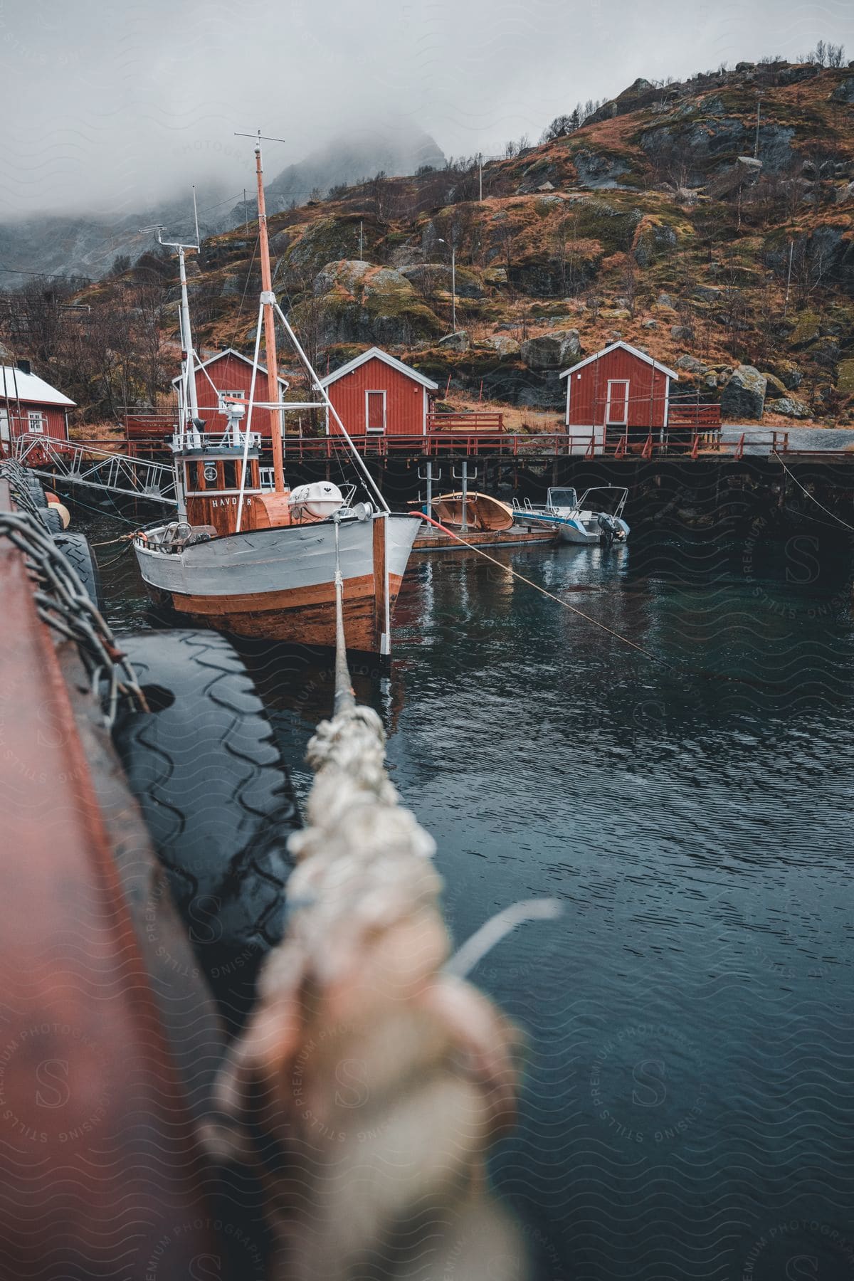 Boats docked near a coastal village