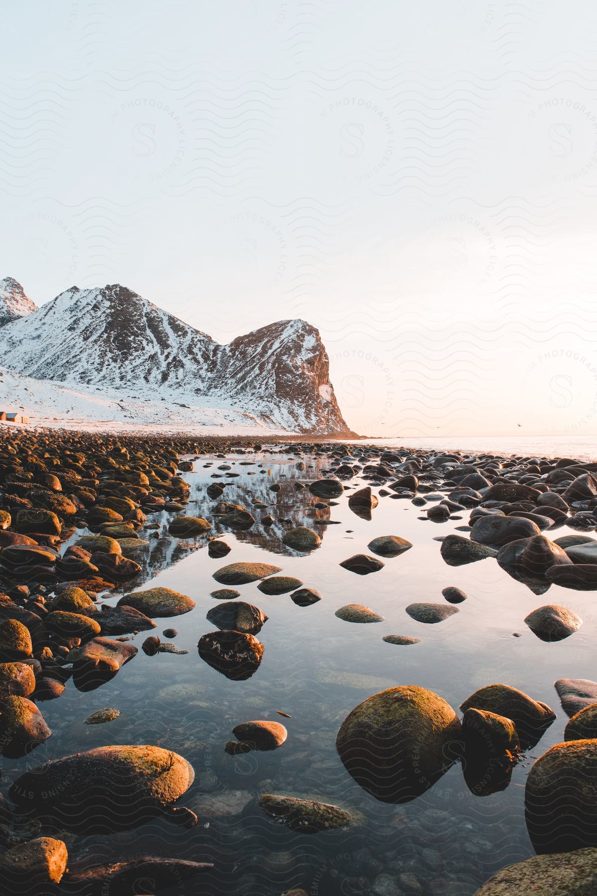 A serene landscape of mountains and water in norway