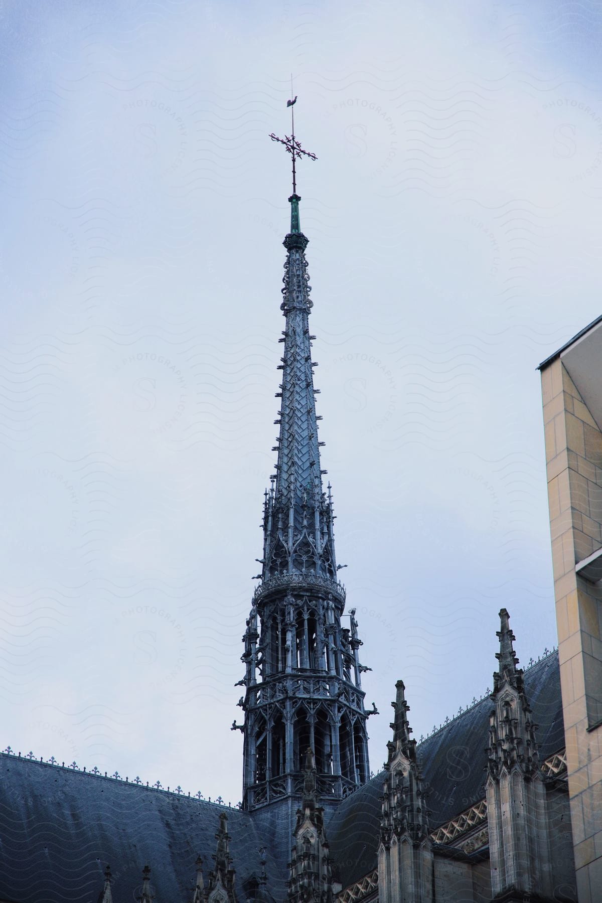 A spire on a tower in amiens cathedral