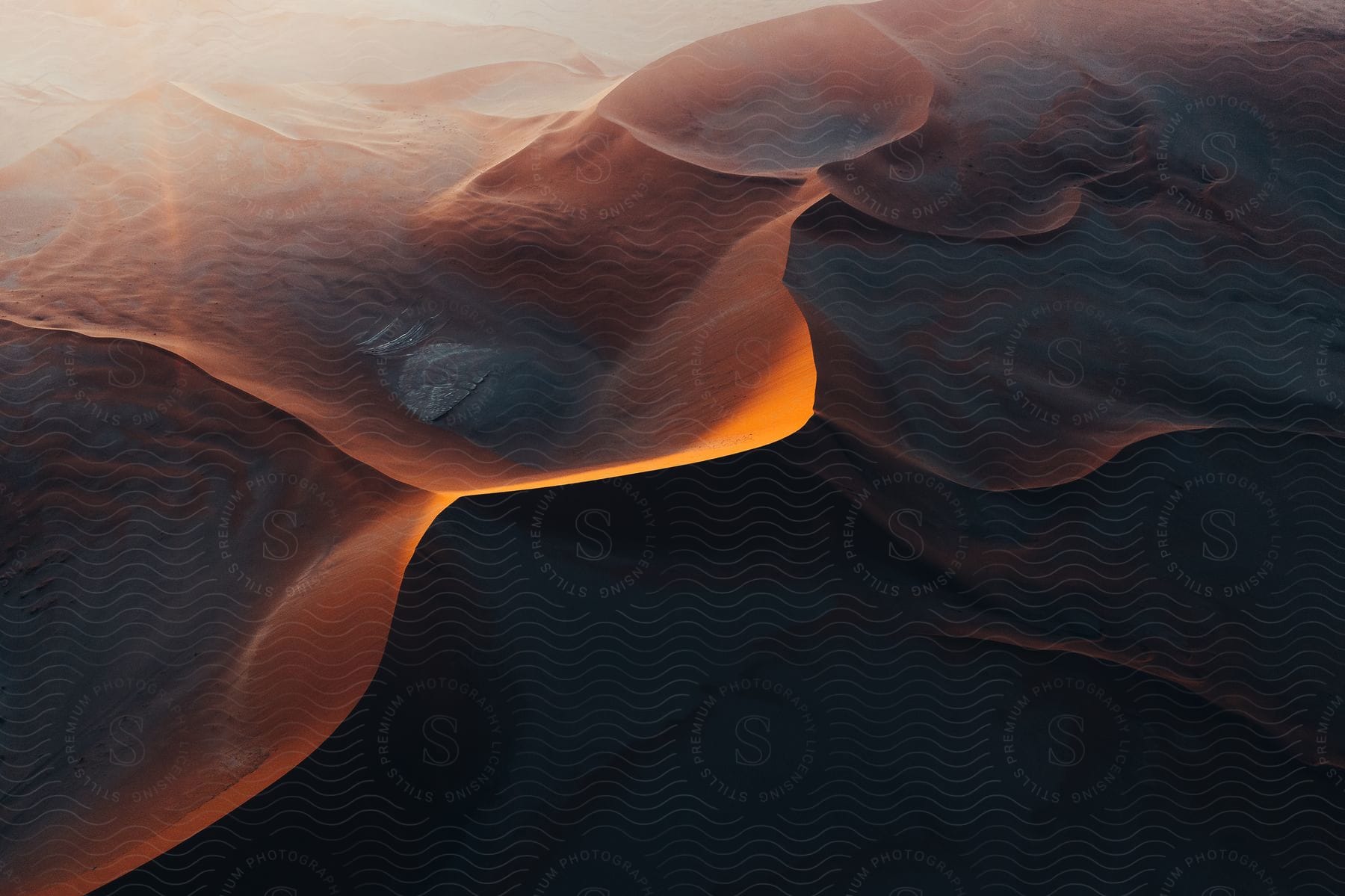 Sand Dunes In The Desert Seen From Above