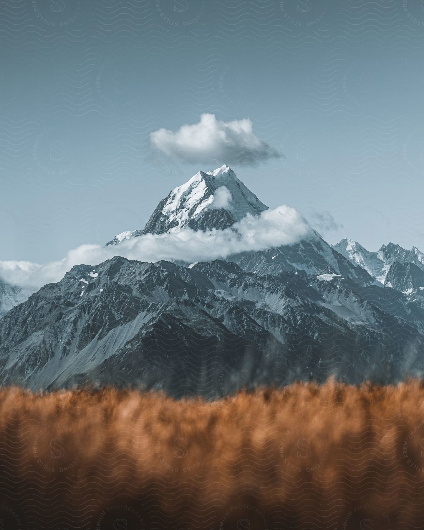 Icecovered rocky mountain landscape with cloudy sky in australia