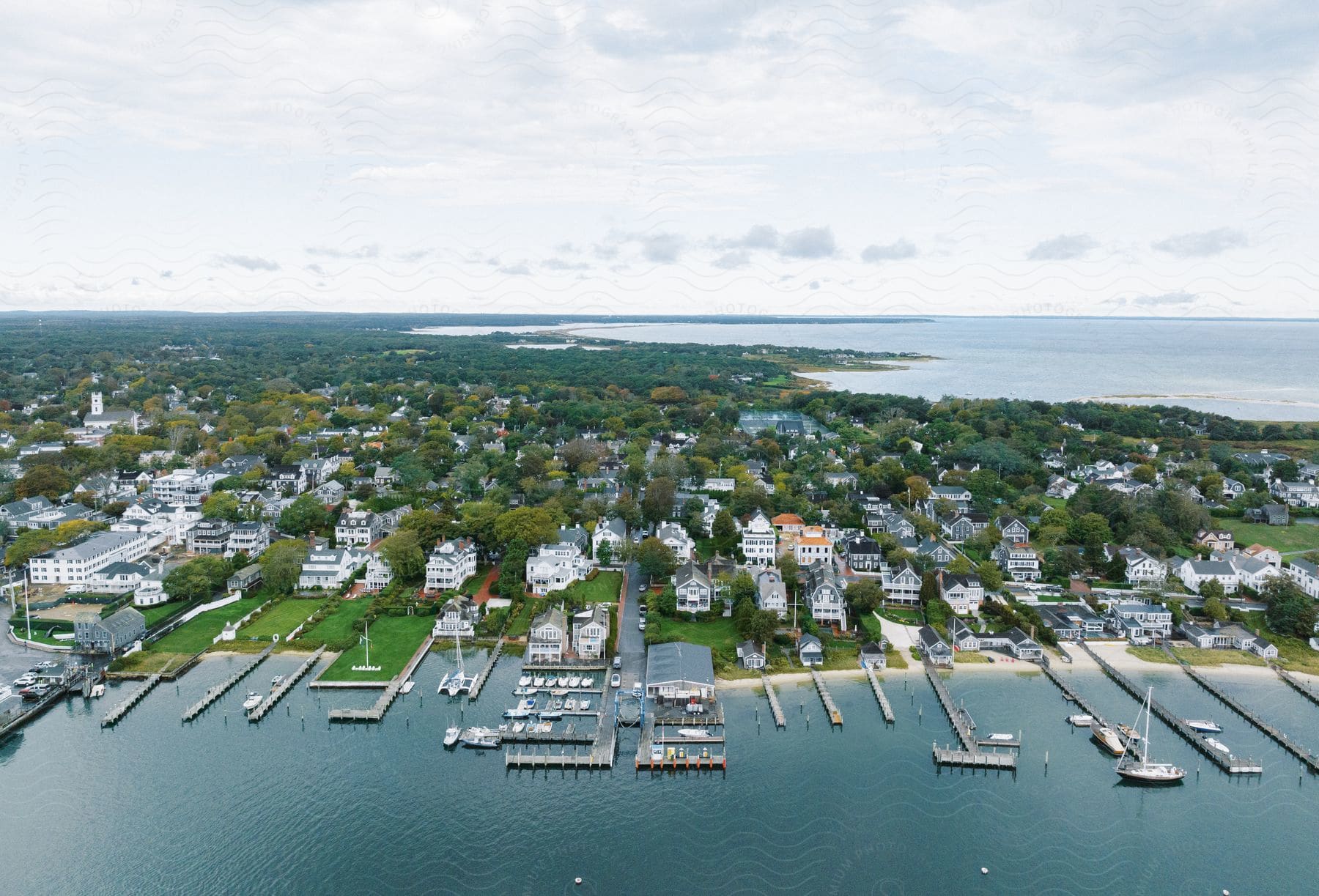 A small coastal island with moored boats