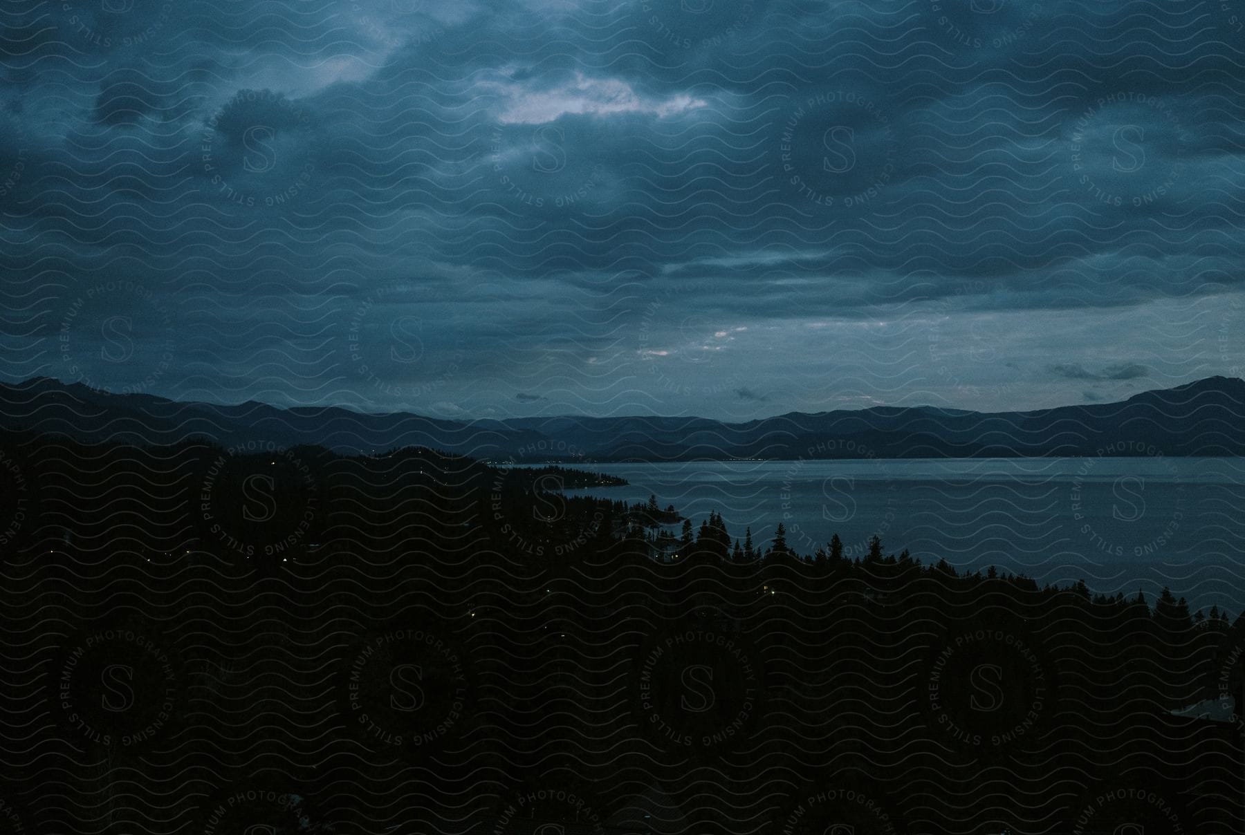 A neutral landscape with cloudy weather mountains and a coastal view