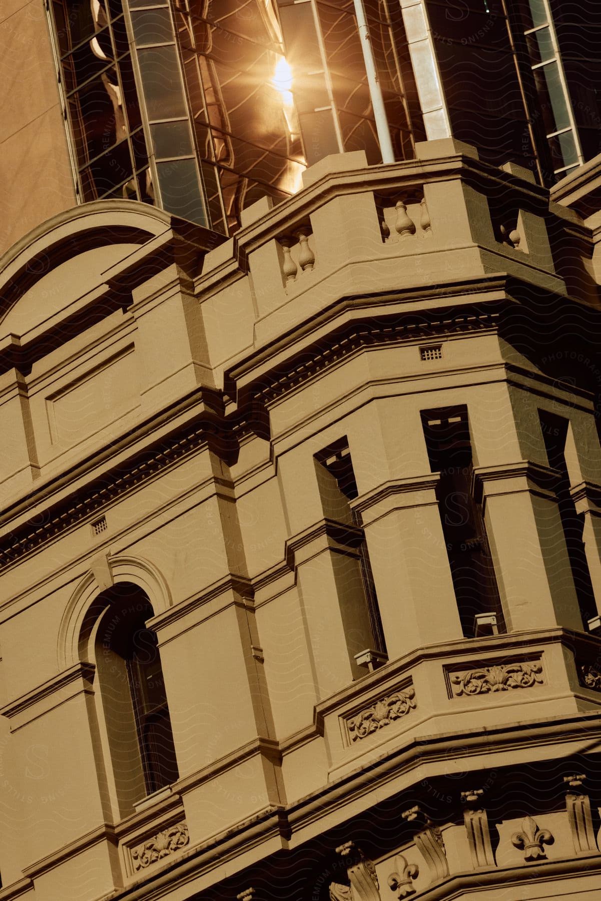 Urban cityscape with buildings and windows illuminated by natural light