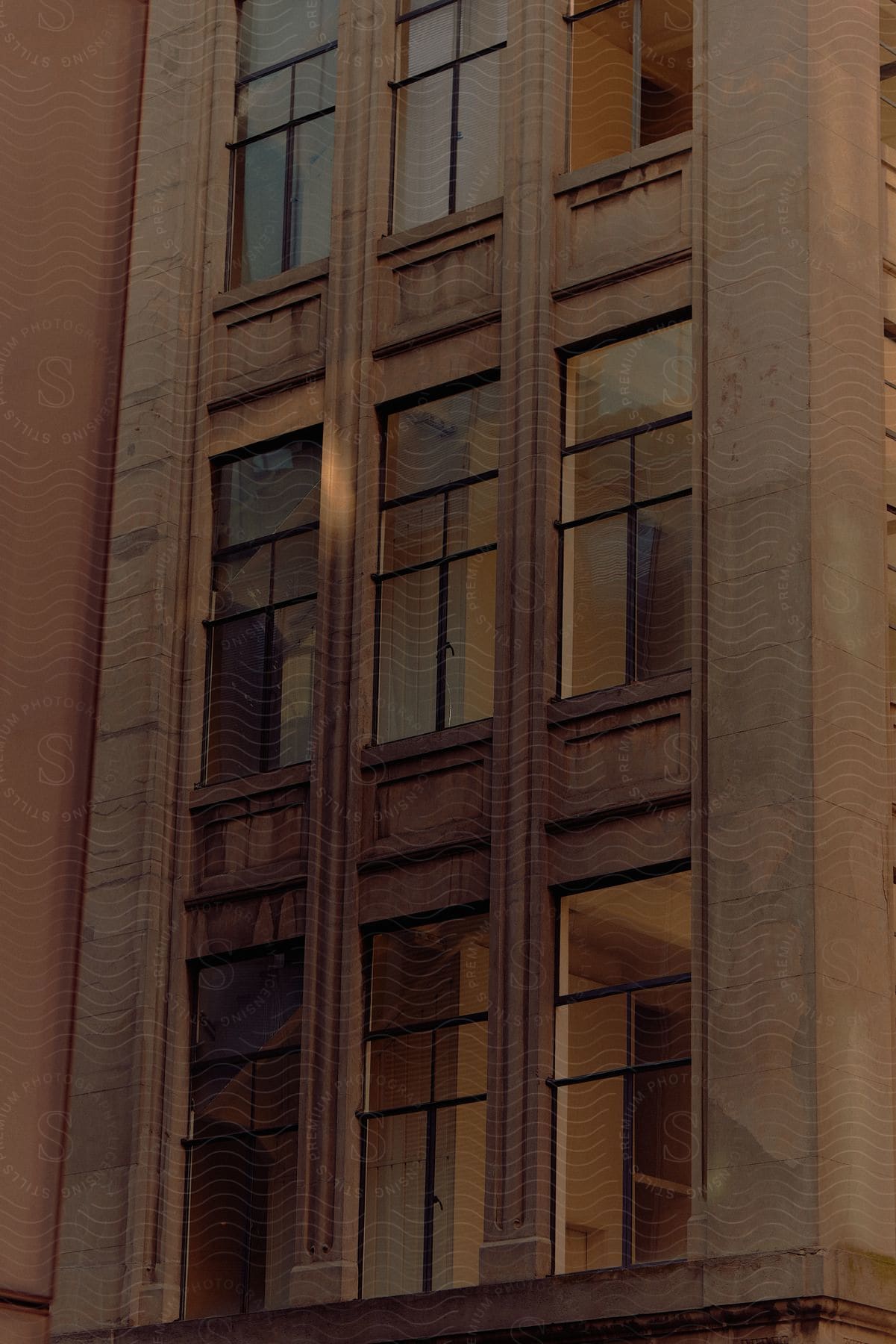 Exterior view of an apartment building with large windows