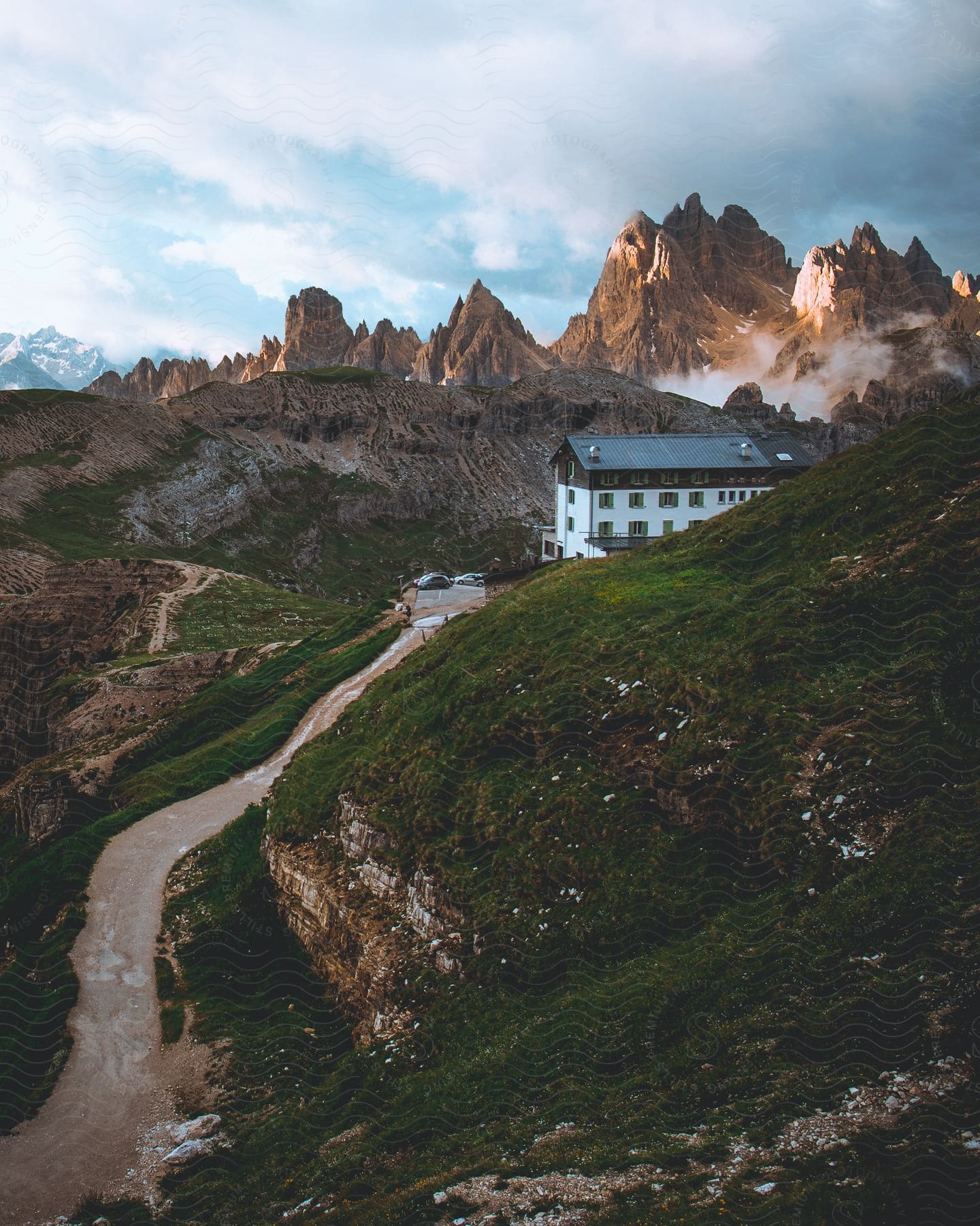 Exterior of rifugio auronzo hut in dolomiti bellunesi national park showcasing the misty scenery