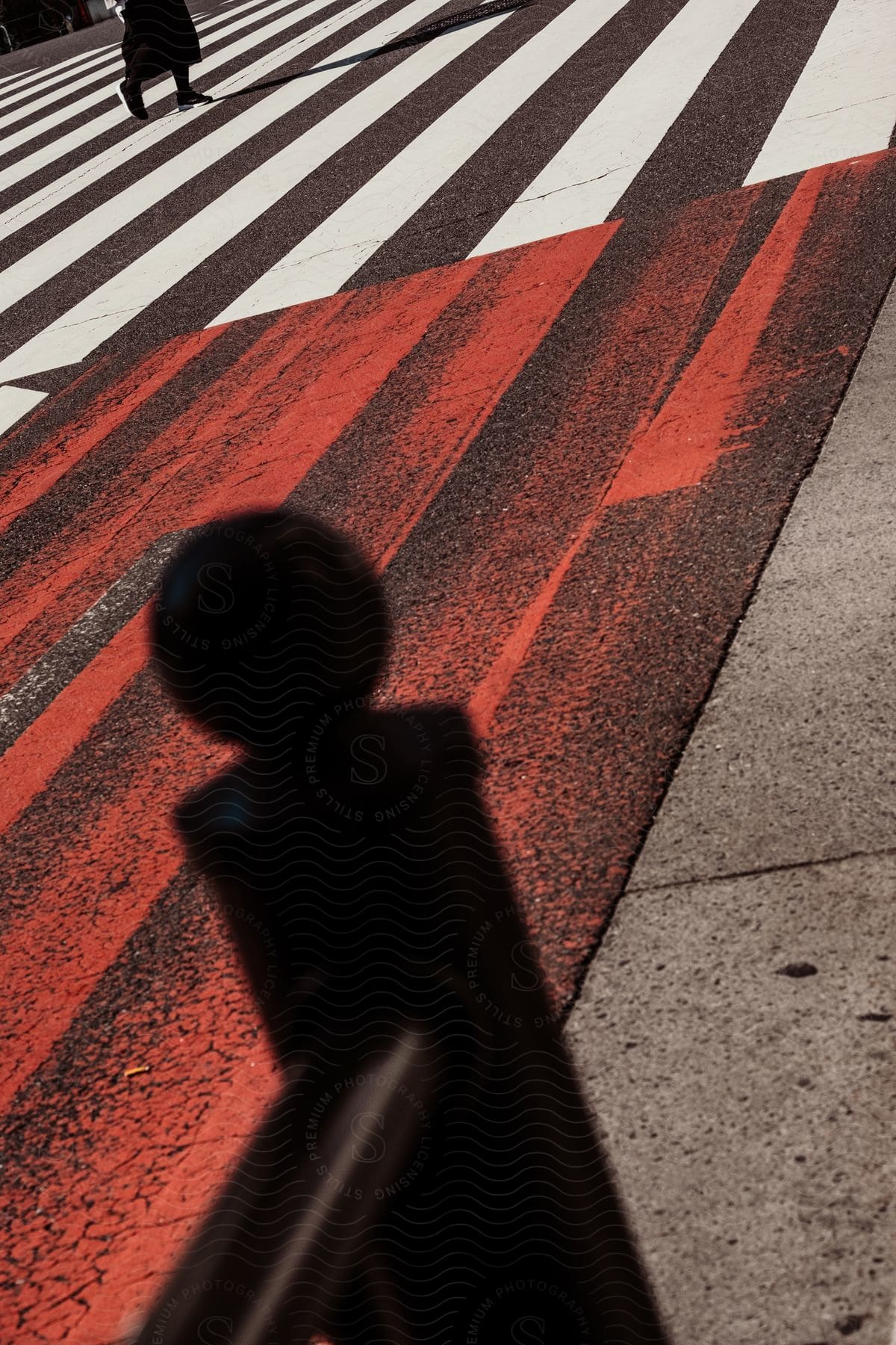 Street photograph of a crosswalk with people walking