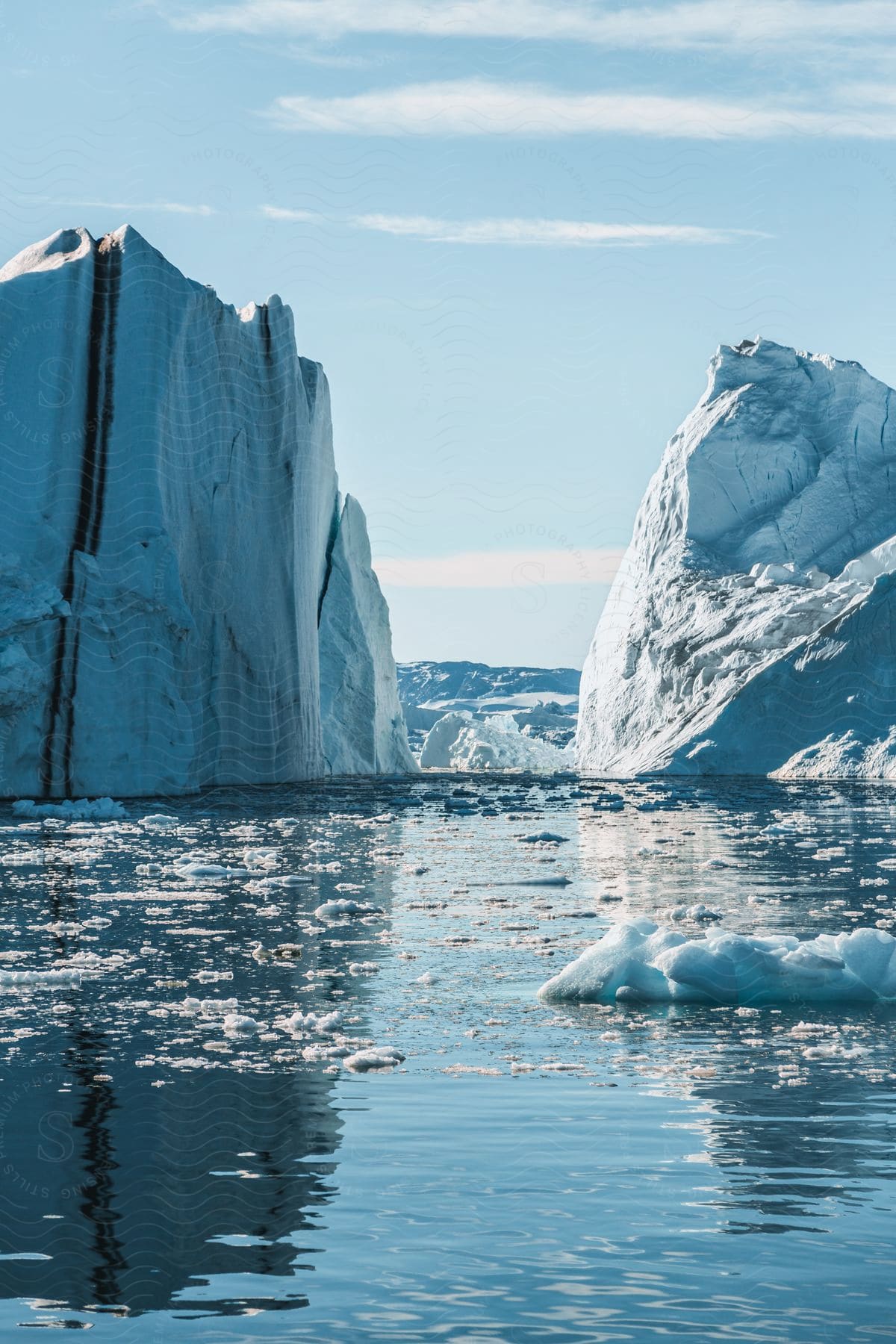 A large floating mass of ice detached from a glacier ice sheet and carried out to sea in greenland