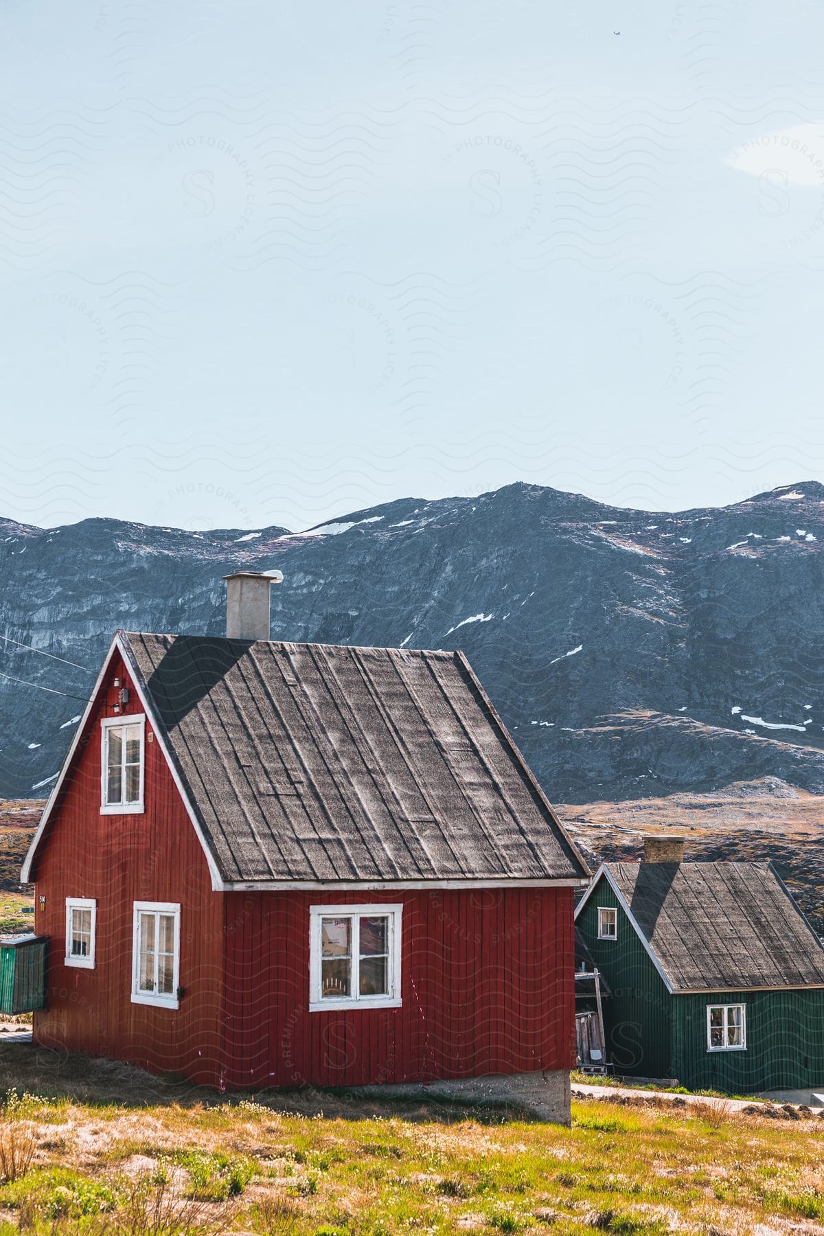 Landscape of houses in a small town with distant mountains