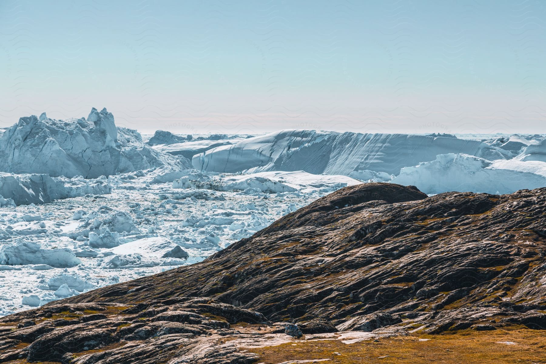 A serene natural landscape of an ice cap slope in greenland
