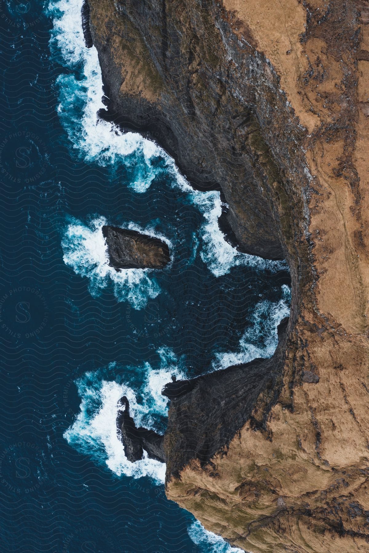 Aerial view of the coastal landscape with water and terrain