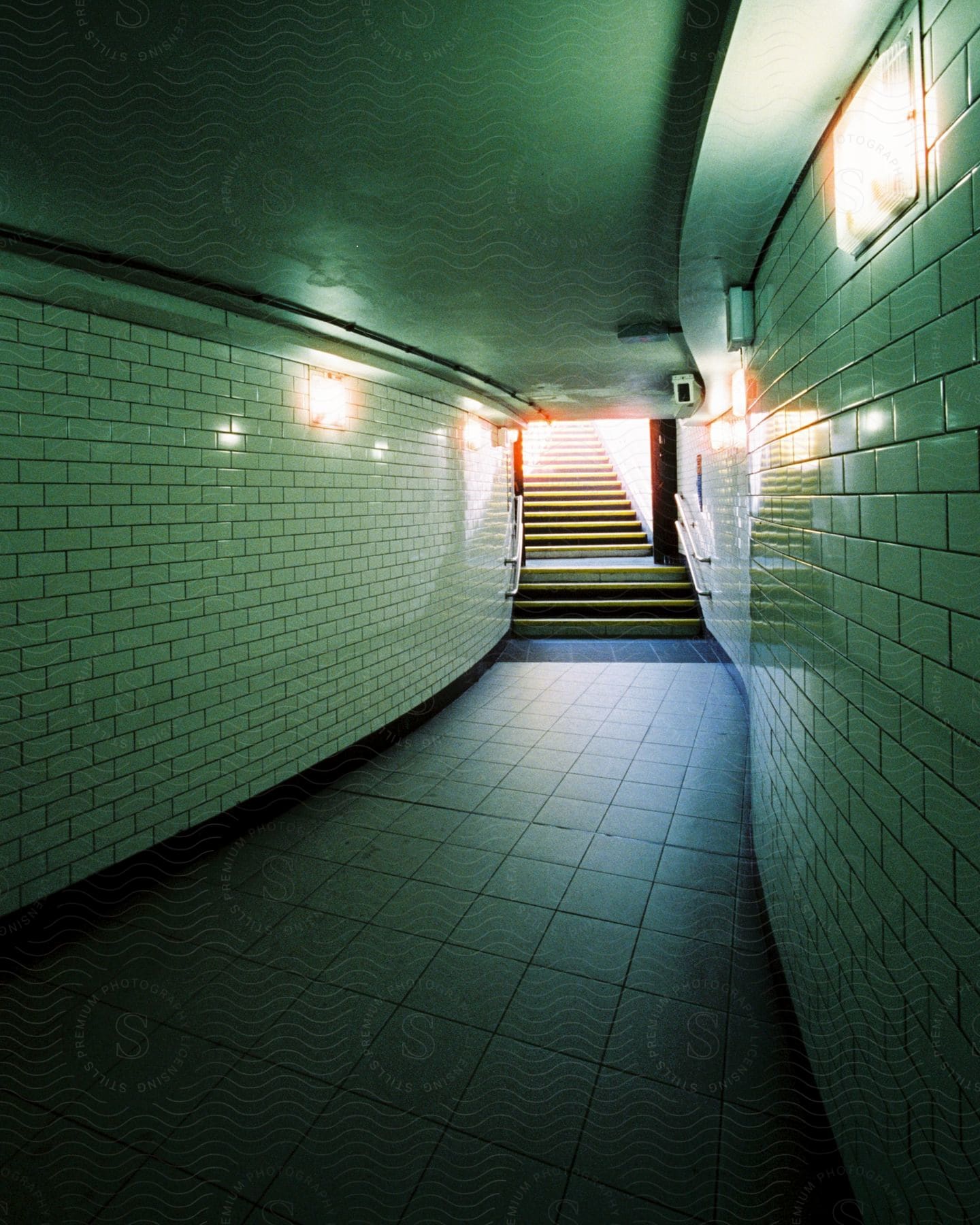 Staircase leading to a tunnel passage underground in an exit of an underground station in london