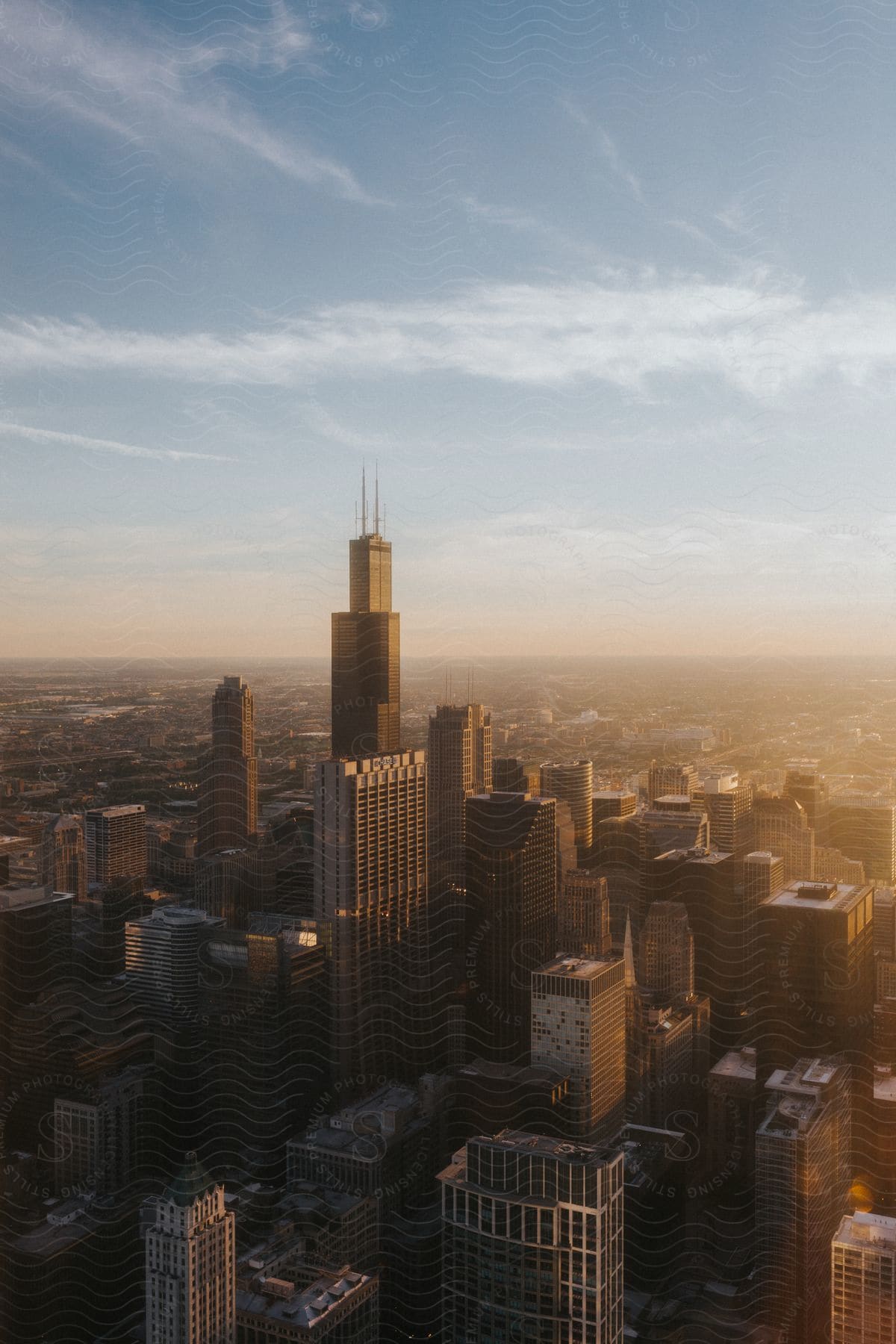 Skyscrapers and high rise buildings at sunset in an urban setting