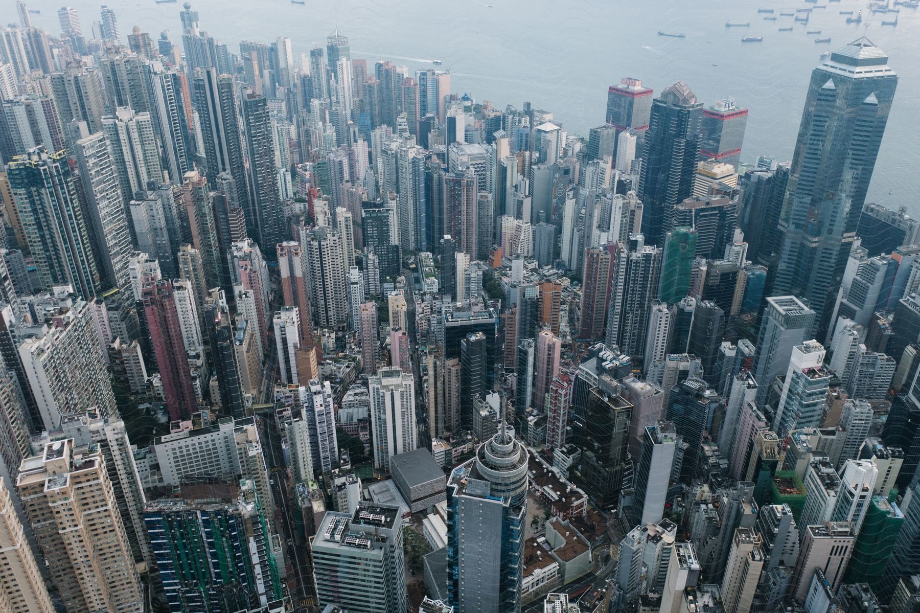 Aerial view of a large metropolitan city with numerous skyscrapers