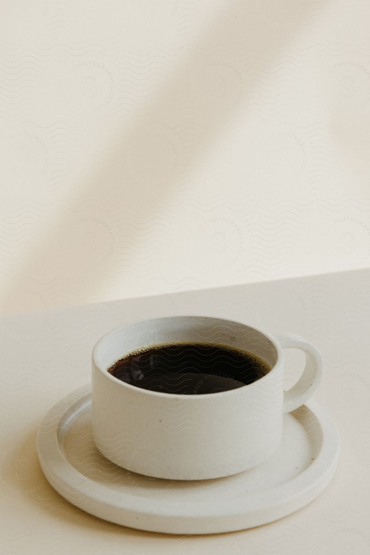 A coffee cup seen up close on a table