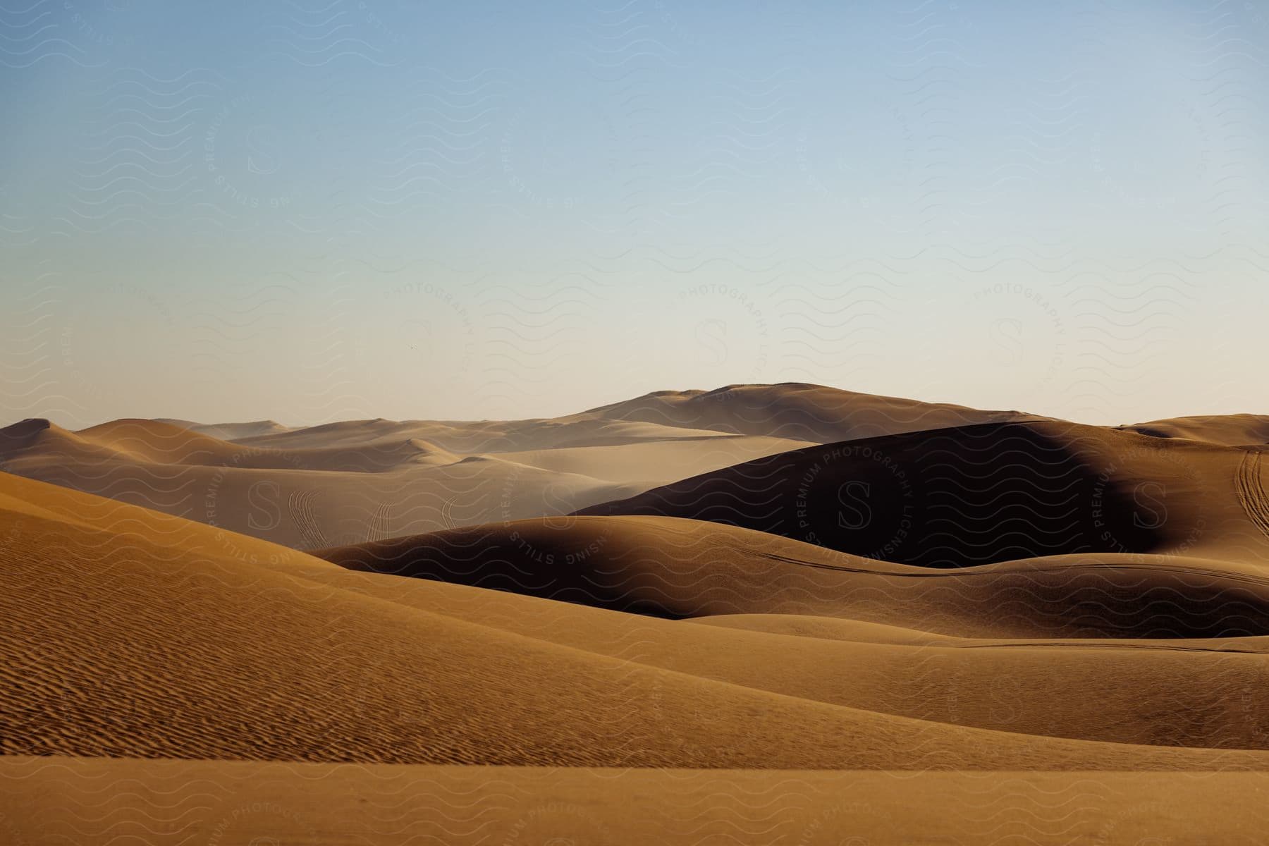 A landscape of sand dunes in the desert